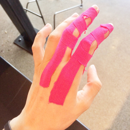 KT Tape on my fingers after two A2 pulley injuries. Photo: Claire Bukowski