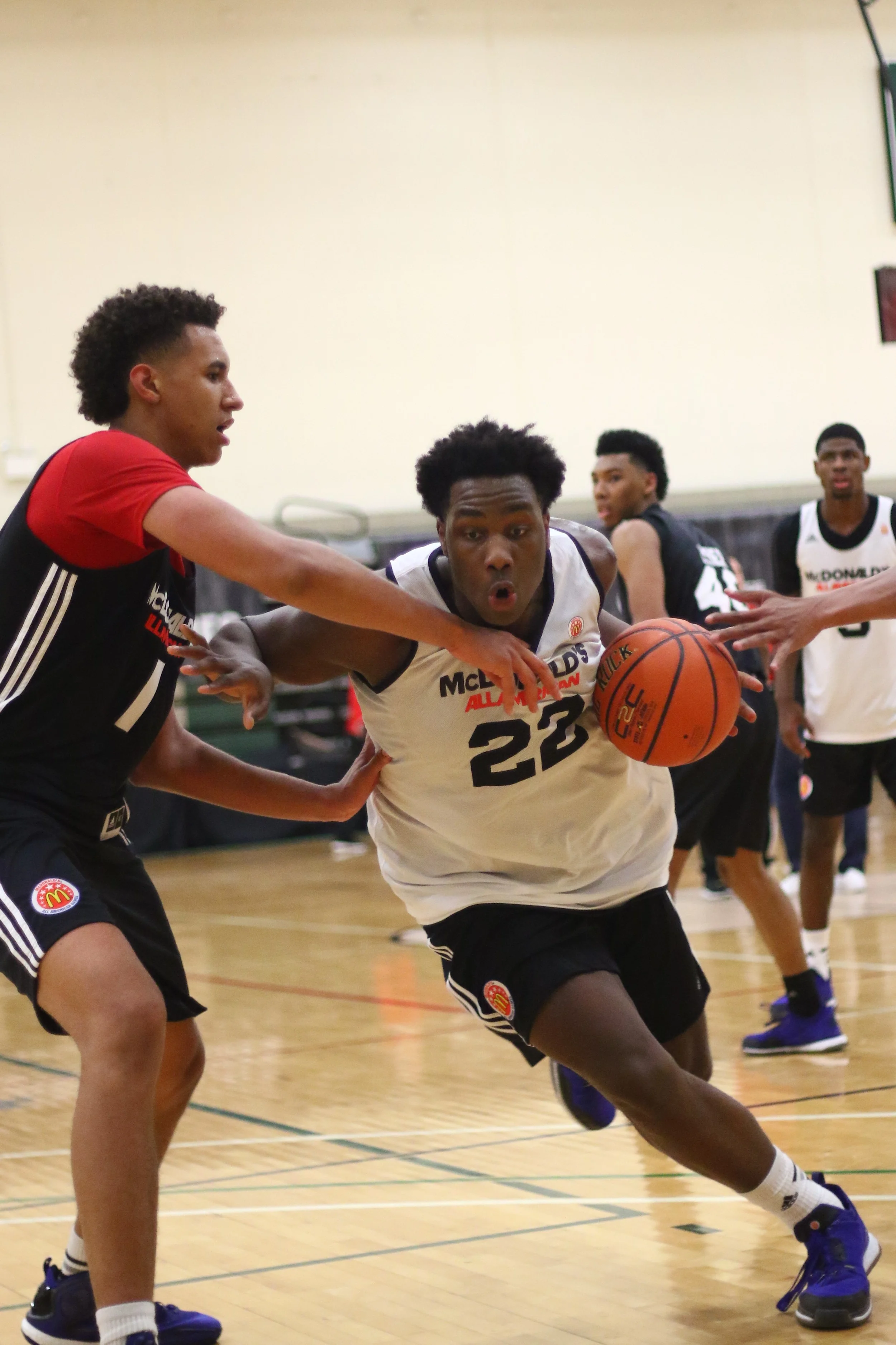 Caleb Swanigan drives on Chase Jeter at the 2015 McDonald's All-American game closed practice