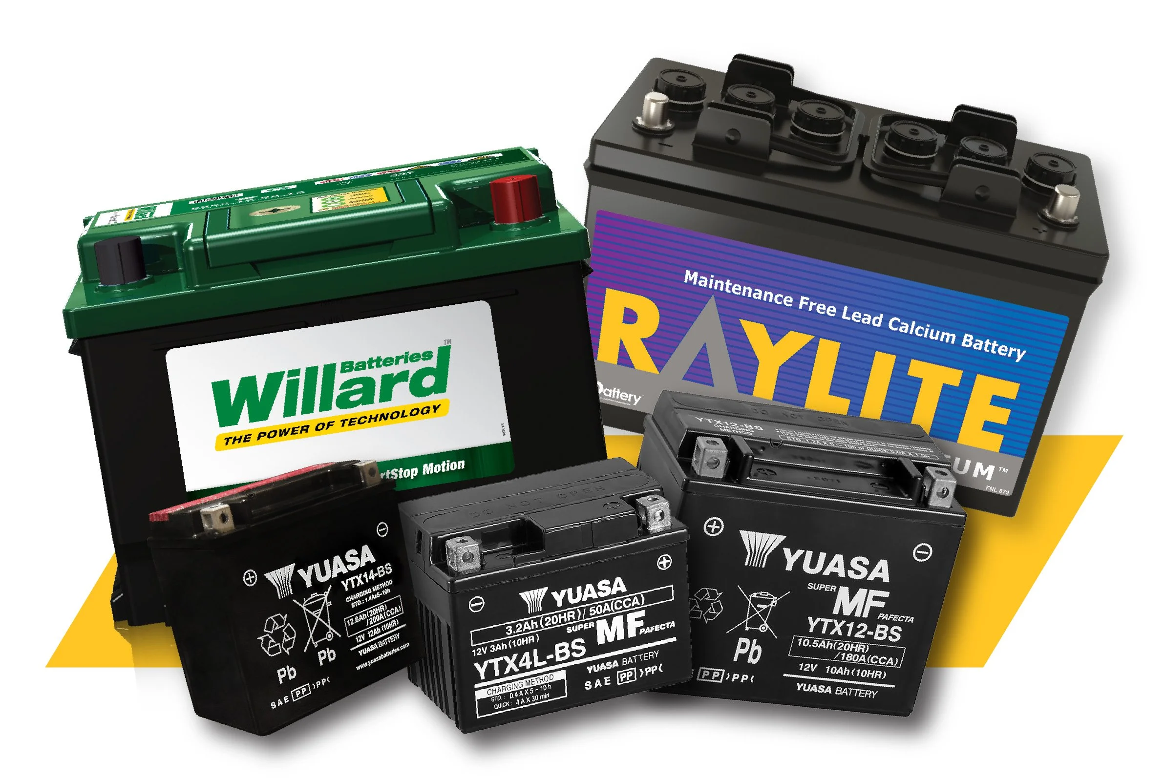 Mechanic in blue coveralls and white gloves holding a car battery over the open engine bay of a vehicle.