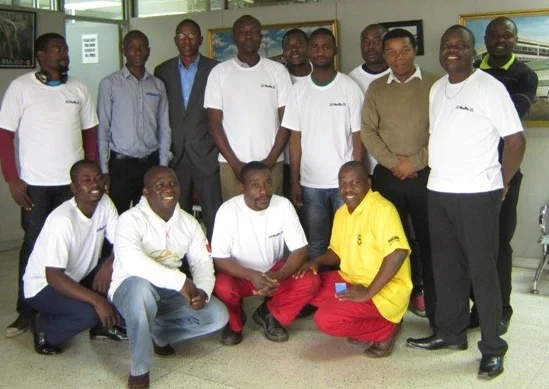 Holts training workshop at Autoworld with participants and David Phiri, the facilitator