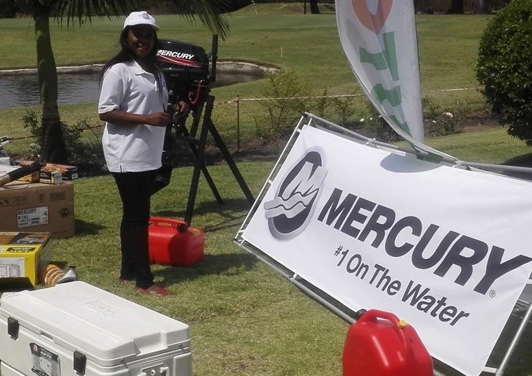 Miriam of Autoworld Kitwe with some of the products on display at the 18th hole