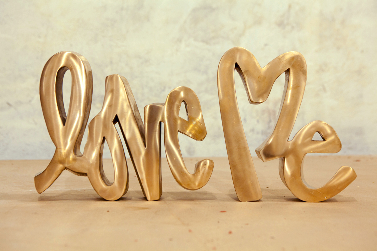 LOVE ME BRONZE. 2012 - 10.5" x 21" x 2" 