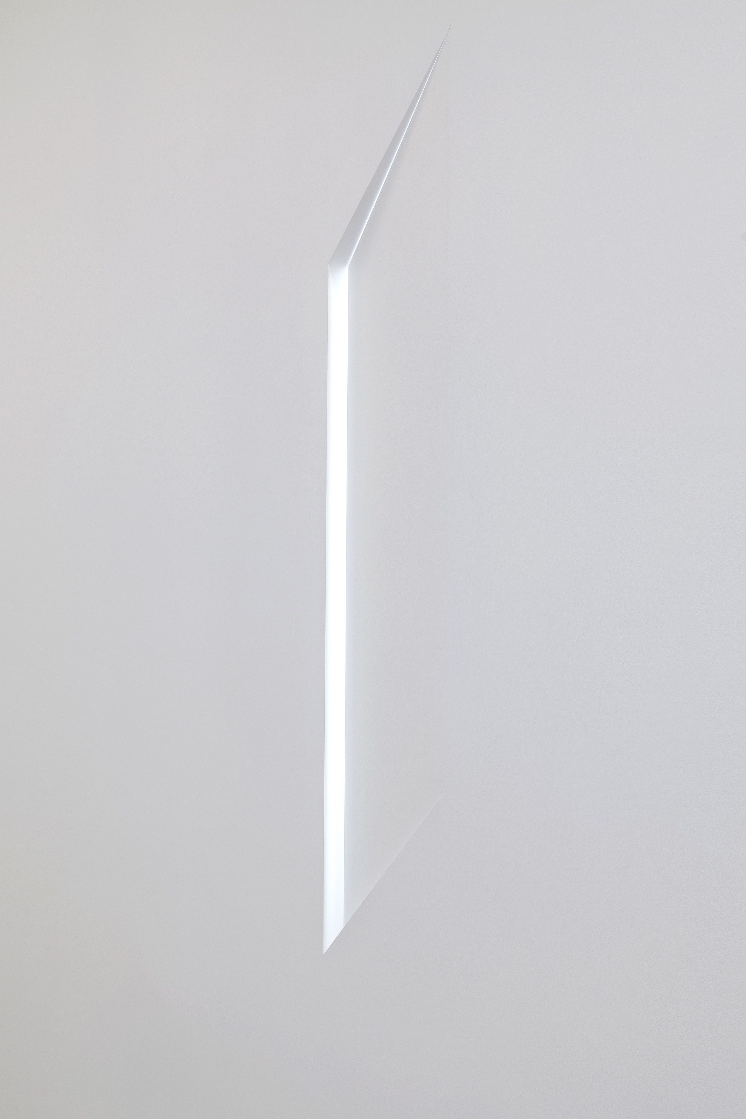  Disclosed Light. Installation constructed into existing wall, revealing and bringing the daylight from a hidden window behind the wall into the galleryspace. 