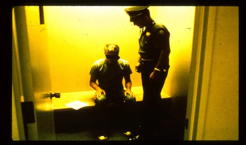 Police Blindfolding Prisoner