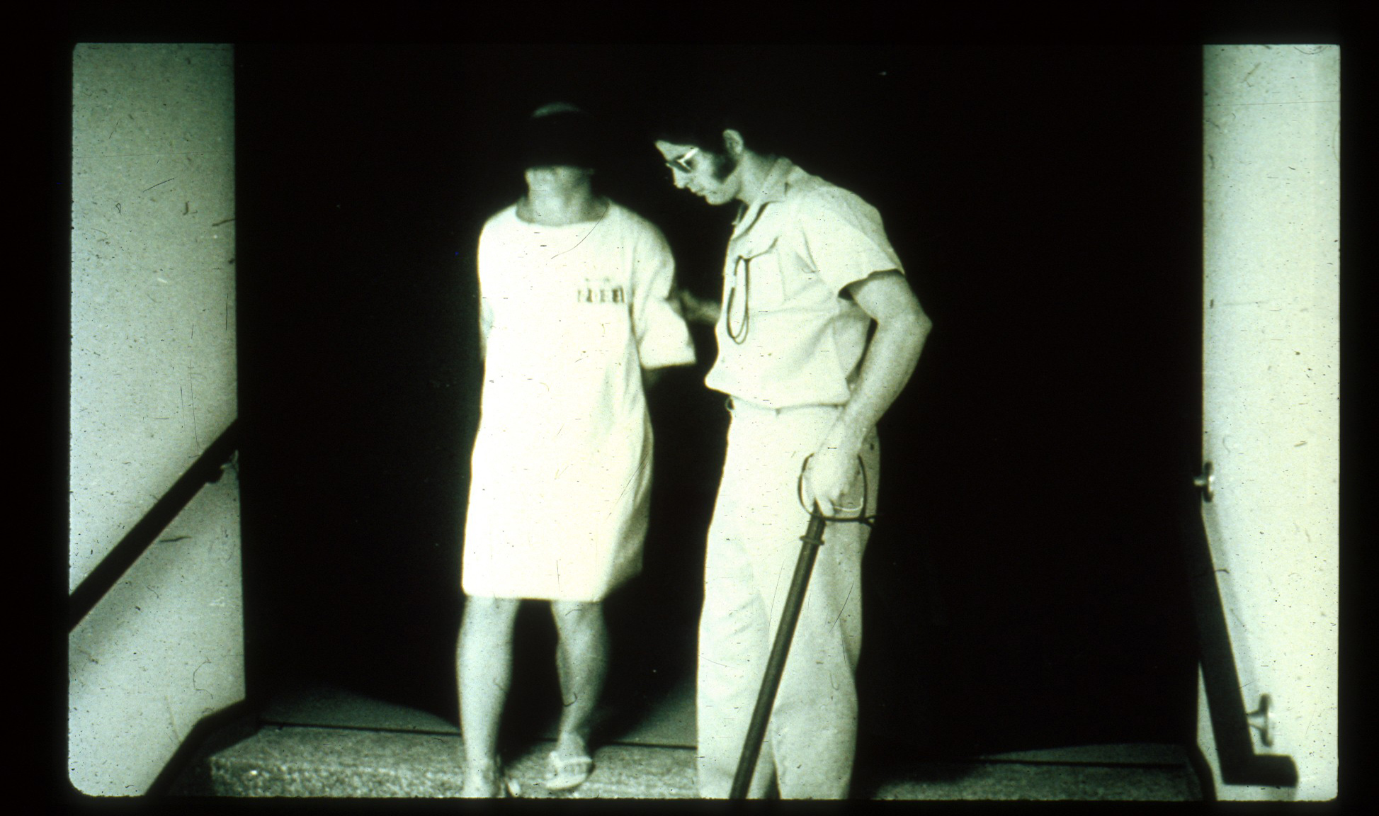 Walking Blindfolded Prisoner