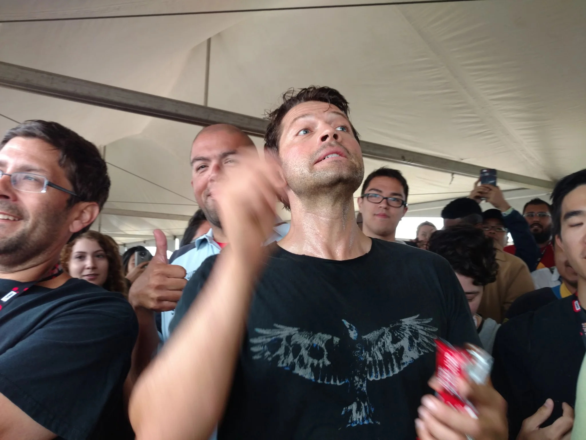 Collins even got into the act of throwing granola bars to the hungry lined up fans.