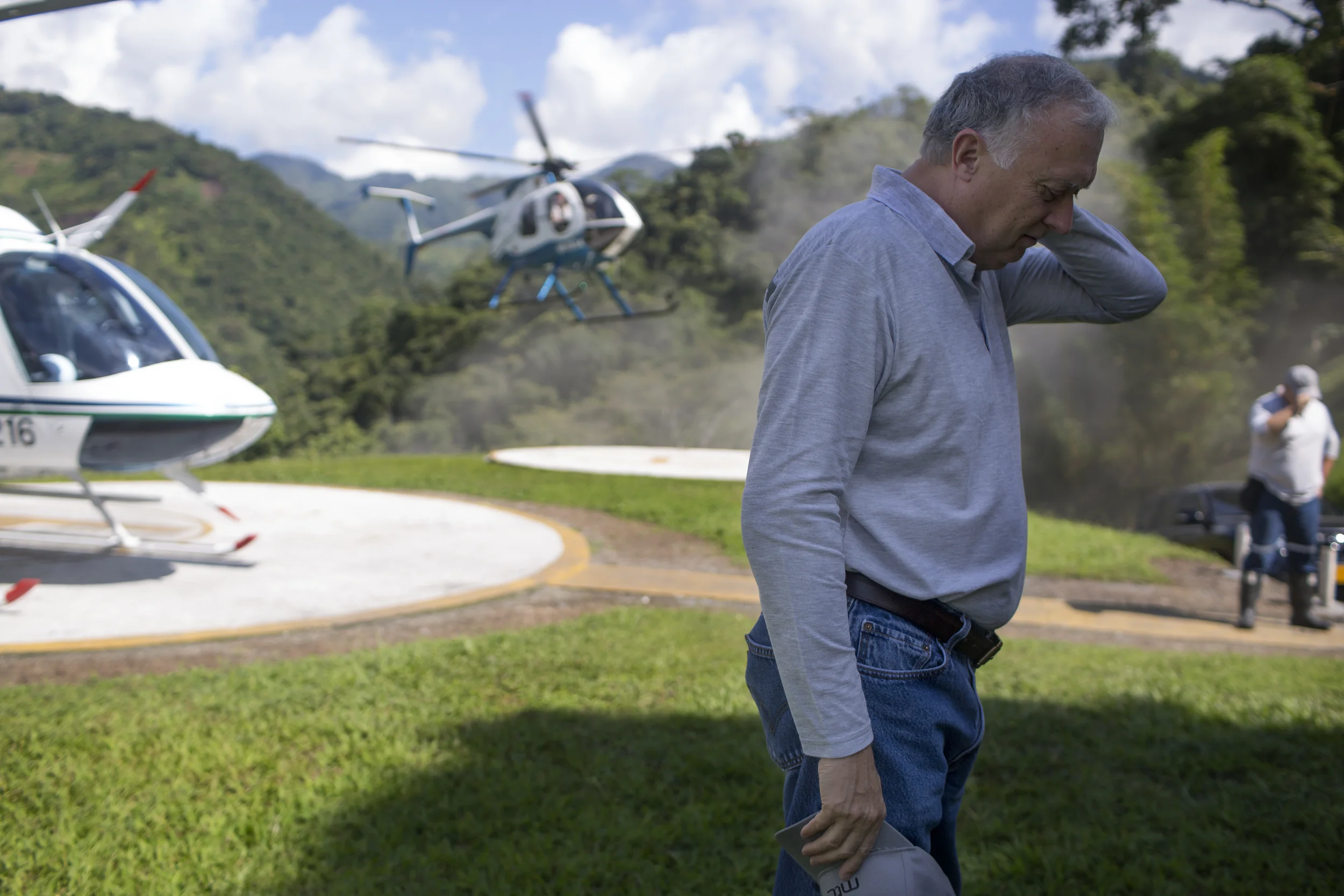 Charles C. Burgess, Director of Minería Texas Colombia S.A., arrives to the emerald mine. "How could people be happy?" A local in Muzo said. "They're putting tons of emeralds on a helicopter and flying it all away."