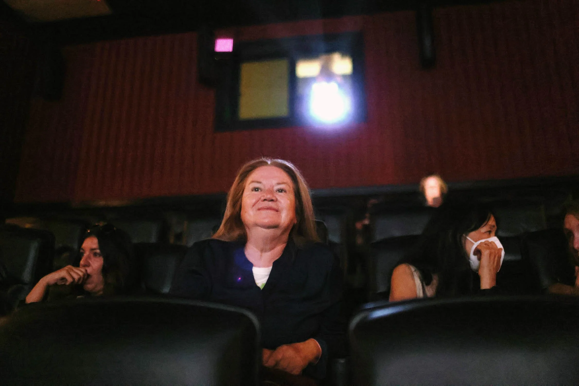 Gabriella smiles as the closing credits of Where the Crawdad Sings play at a movie theater where she was joined by her dear friends on her last full day of life before dying through medical aid on July 15, 2022 in Oxnard, CA. Gabriella listened to a