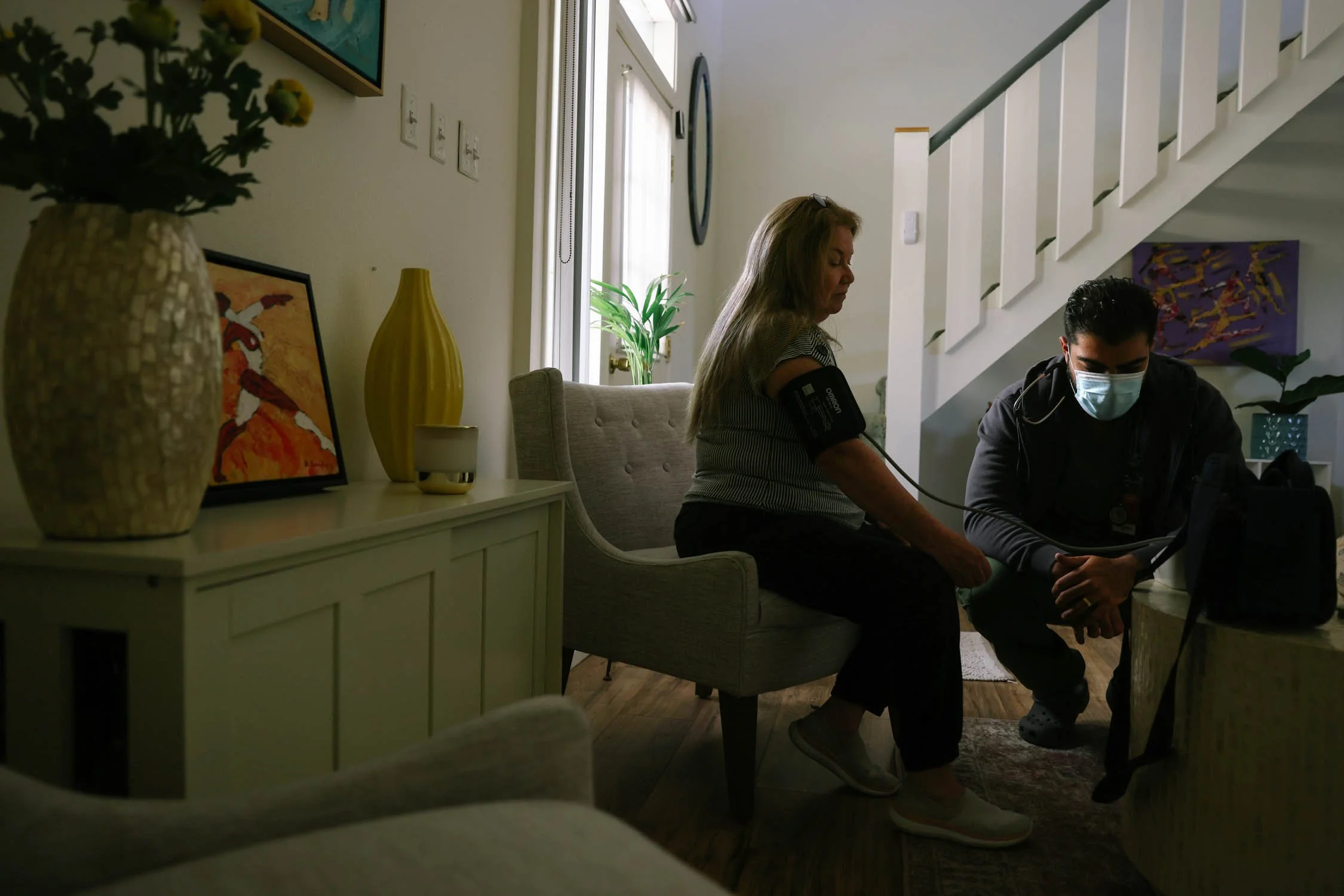 Gabriella has her vitals taken by a nurse who managed her hospice care, Jack Barsegyan on Thursday, June 9, 2022 in Santa Paula, CA. They discuss the medicine Gabriella will ingest for her death and what sort of food she should eat the night before.