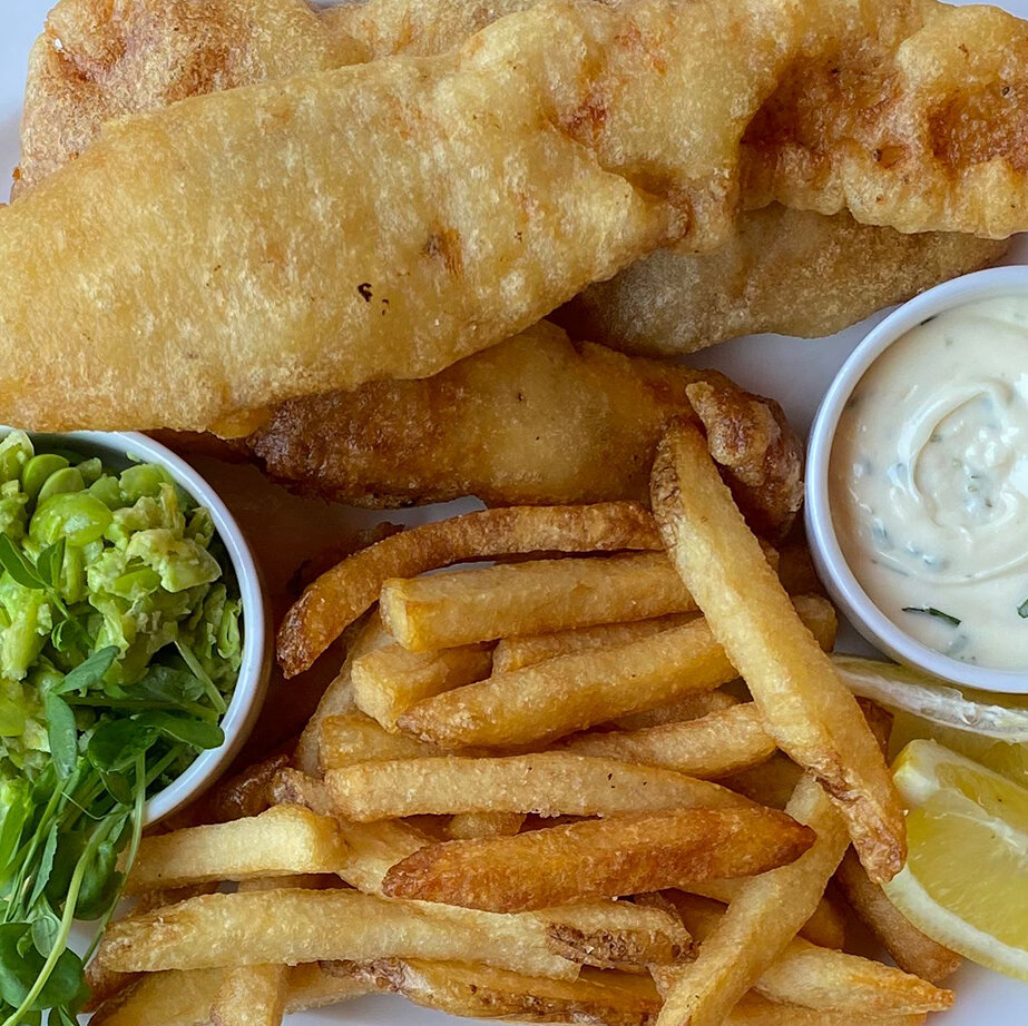 There is nothing more delicious than fish &amp; chips by the sea. 🐟🍟🍺

 #FishAndChips #SeafoodLovers #BeachEats #FoodLovers #Foodie #oceanbeach #beachchalet