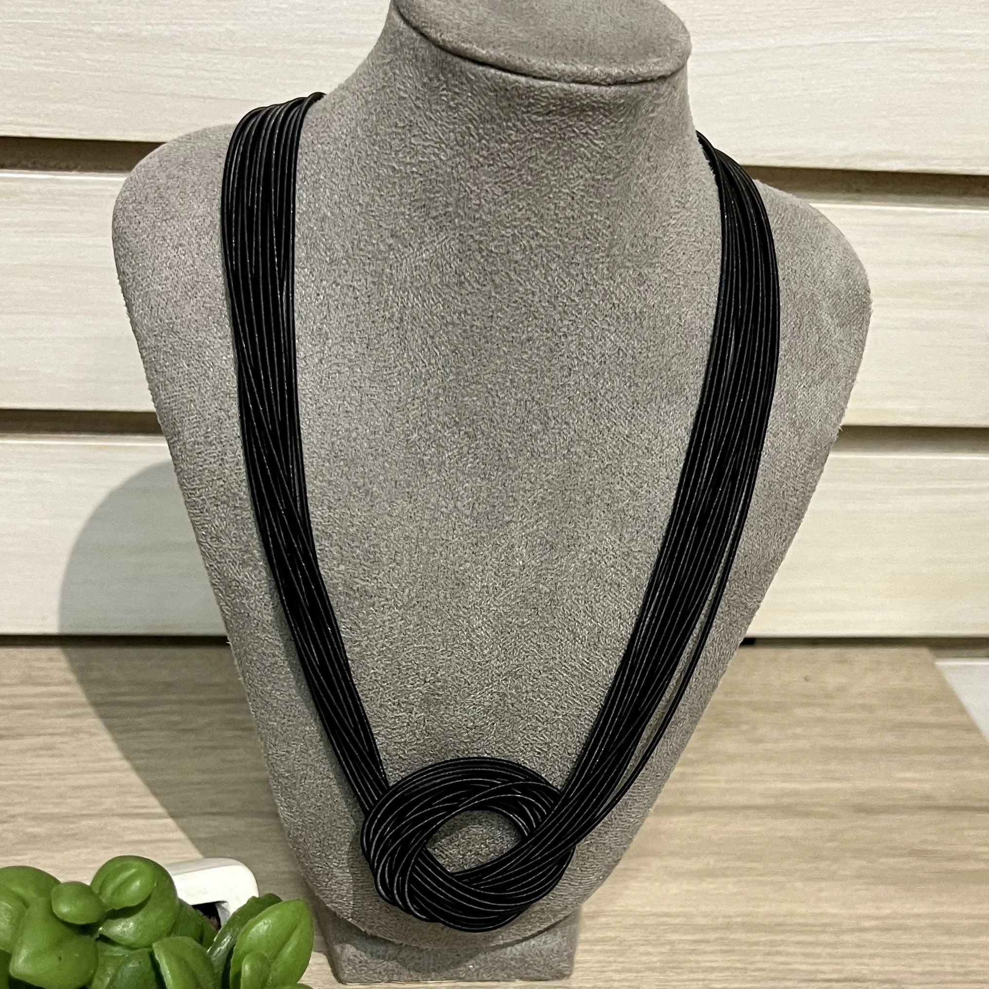 Piano wire knot necklace black 2.jpg