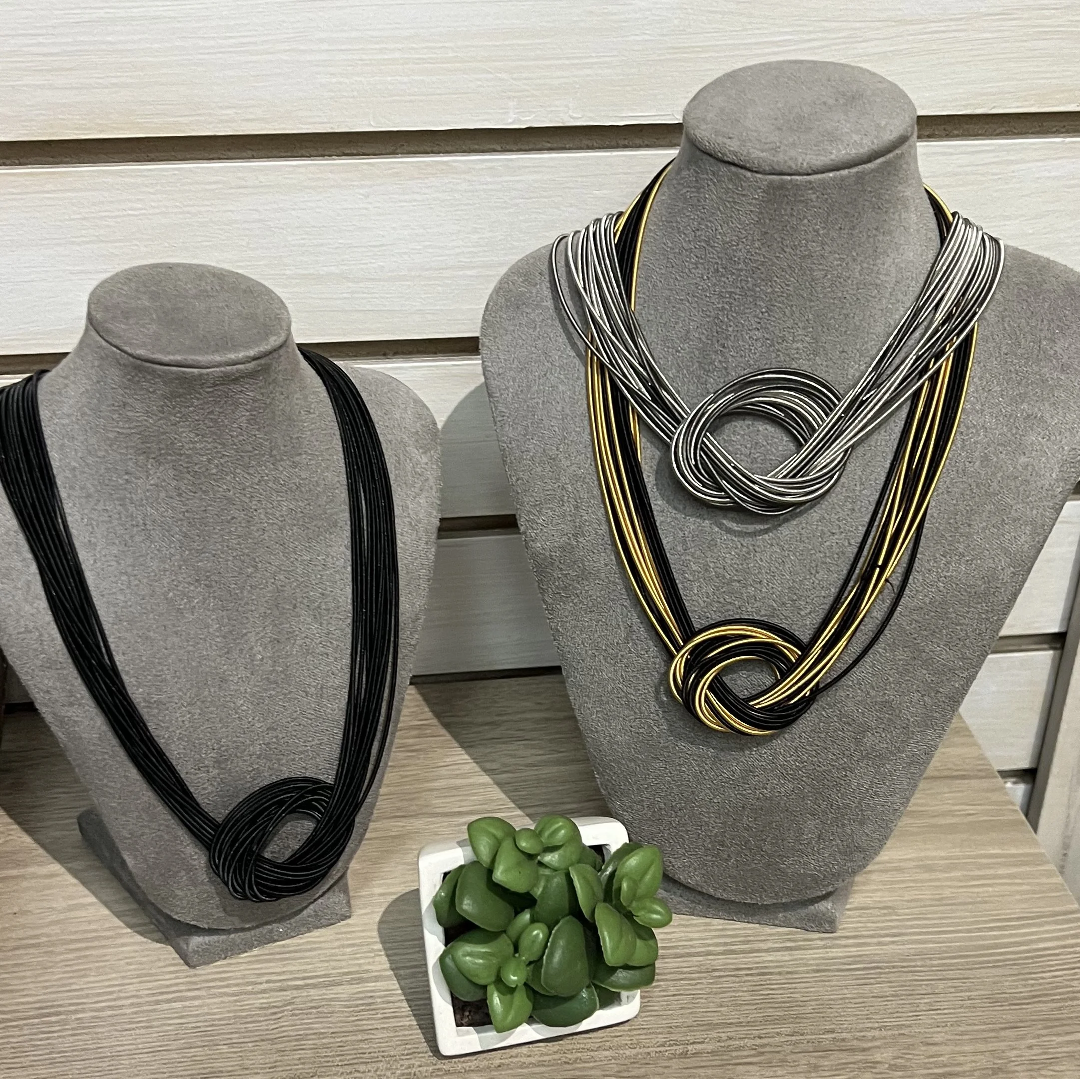 Piano wire knot necklace 3.jpg