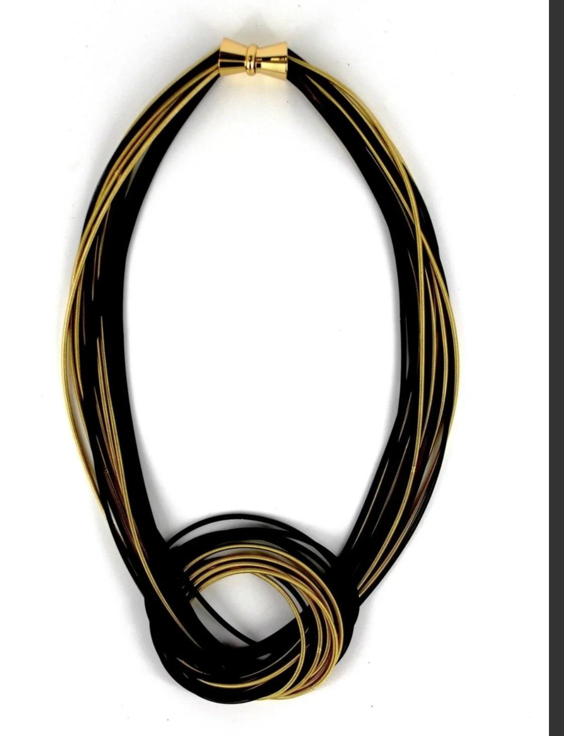 Piano wire knot necklace black gold.jpg