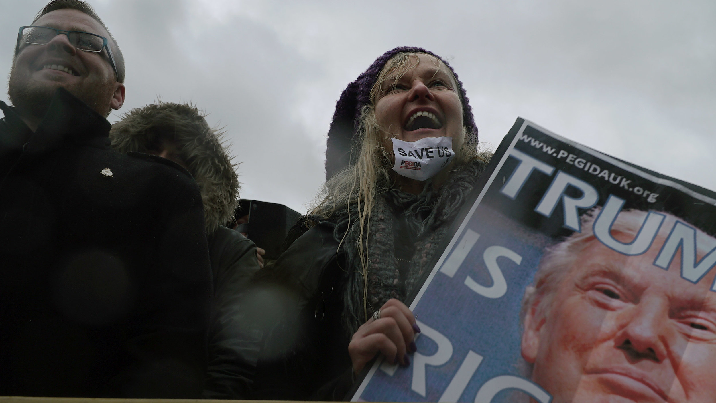  Homemade signs that read “Trump is Right” are carried for miles by PEGIDA marchers in Birmingham, UK. In February 2016, many European countries joined the first Europe-wide PEGIDA protest.  Photo by Sarah McClure  
