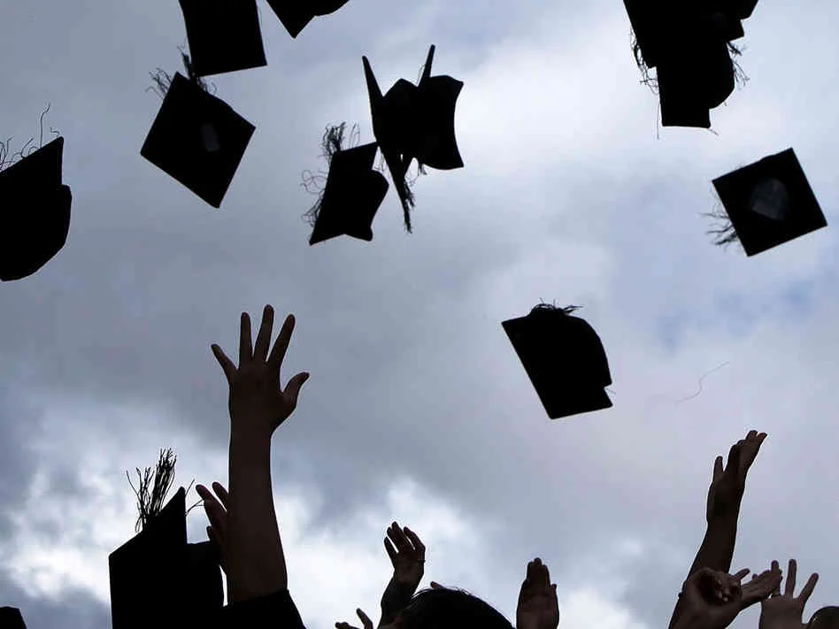 graduates-throwing-hats.jpg