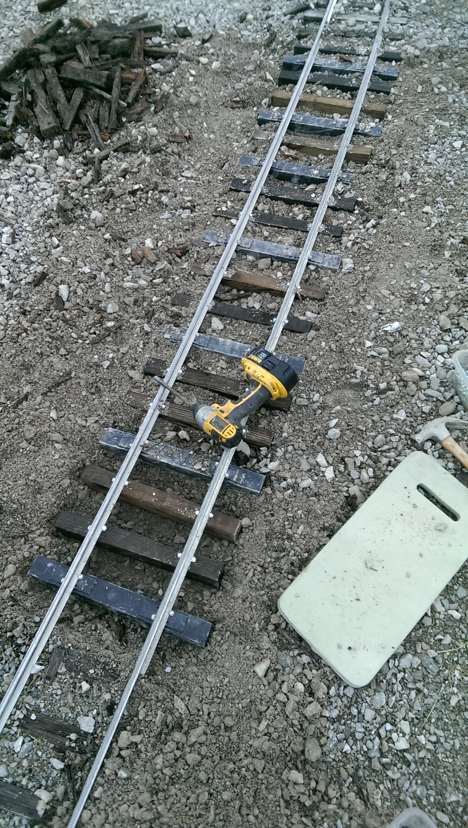 Upper Loop track (From Triple Bridge going toward High Bridge) getting some new plastic and wood ties. Photo Taken during repairs. 