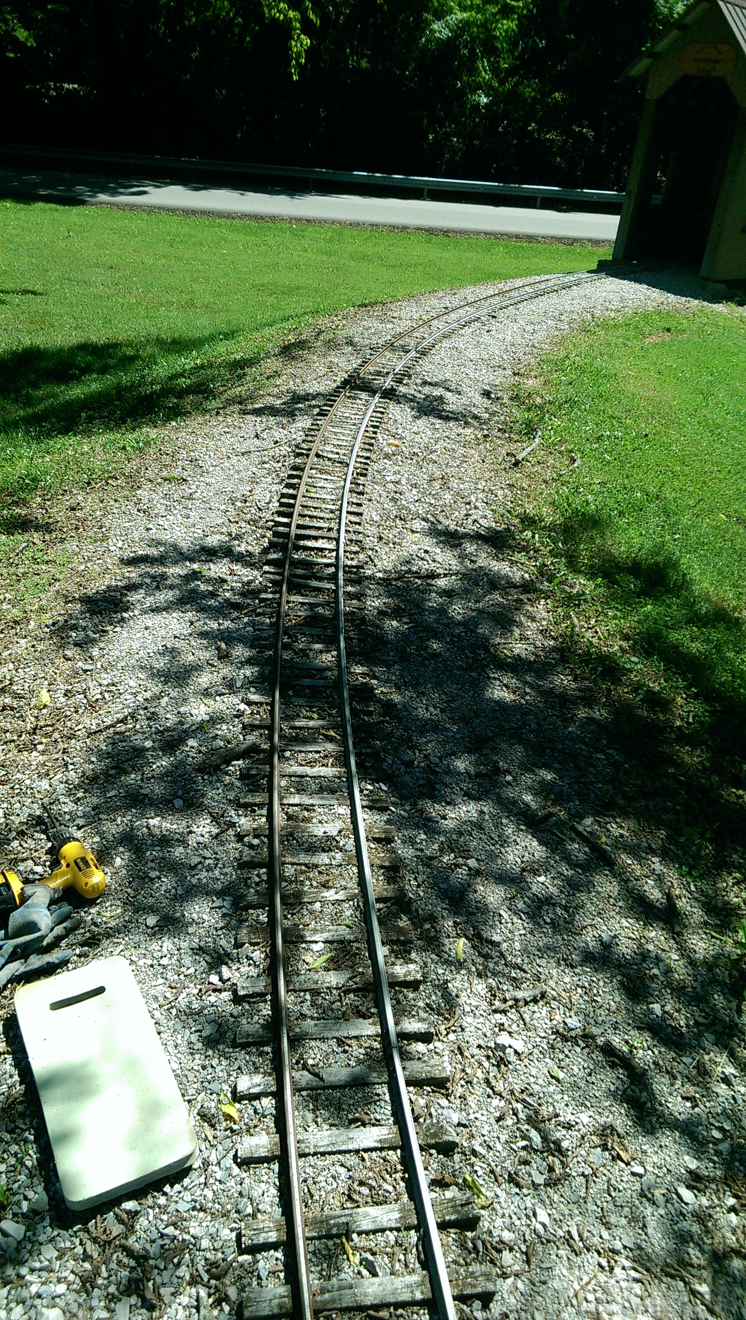 Photo taken before repairs. This section of track is just before the Lower Loop covered bridge. This section of track sits under some very large trees which causes ties to degrade quicker then other areas of the layout.