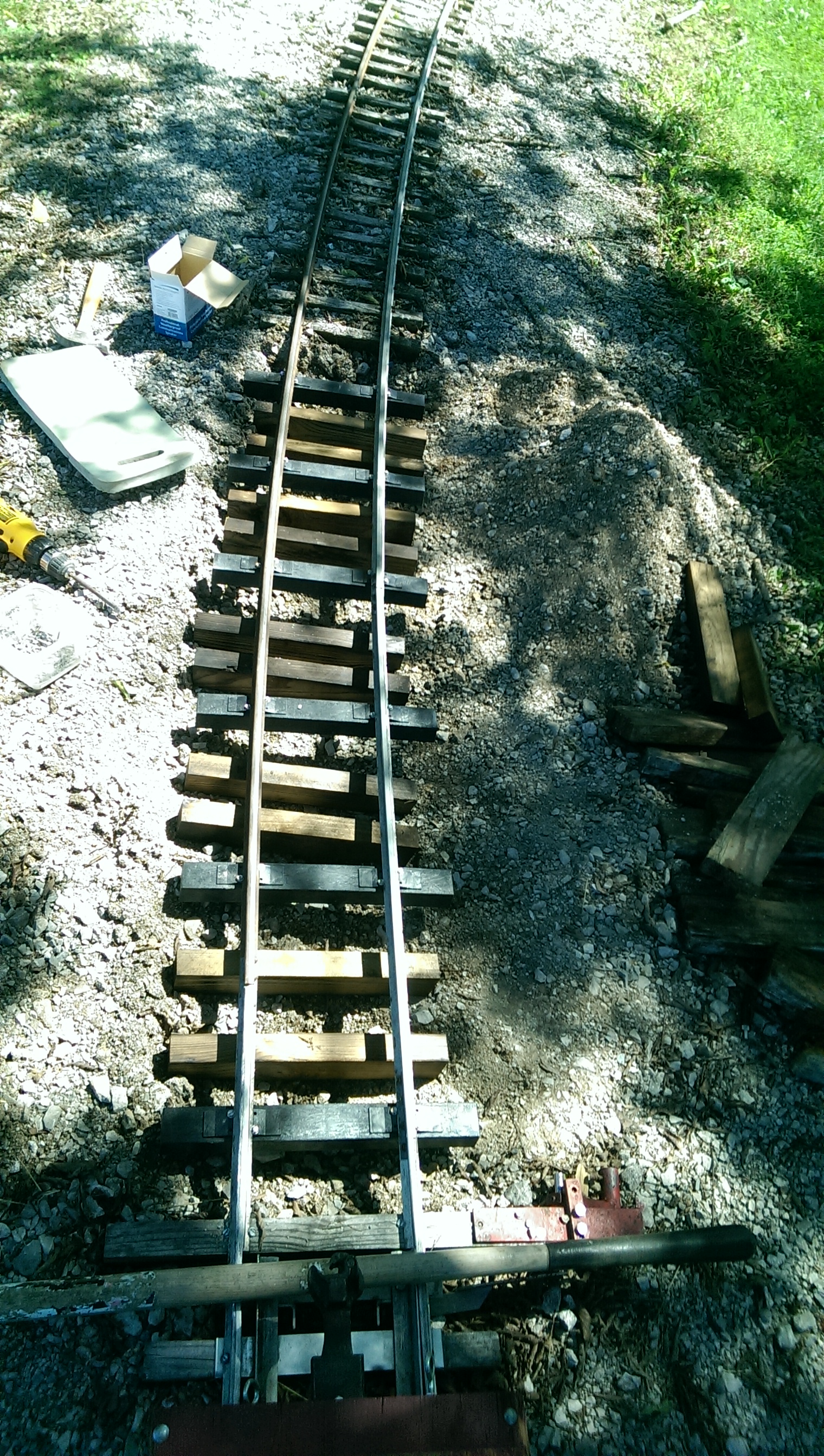 This Photo was taken as the repairs were underway. All the ties from the switch to the Lower Loop Covered Bridge have been replaced ( All track shown in the before image of this section )