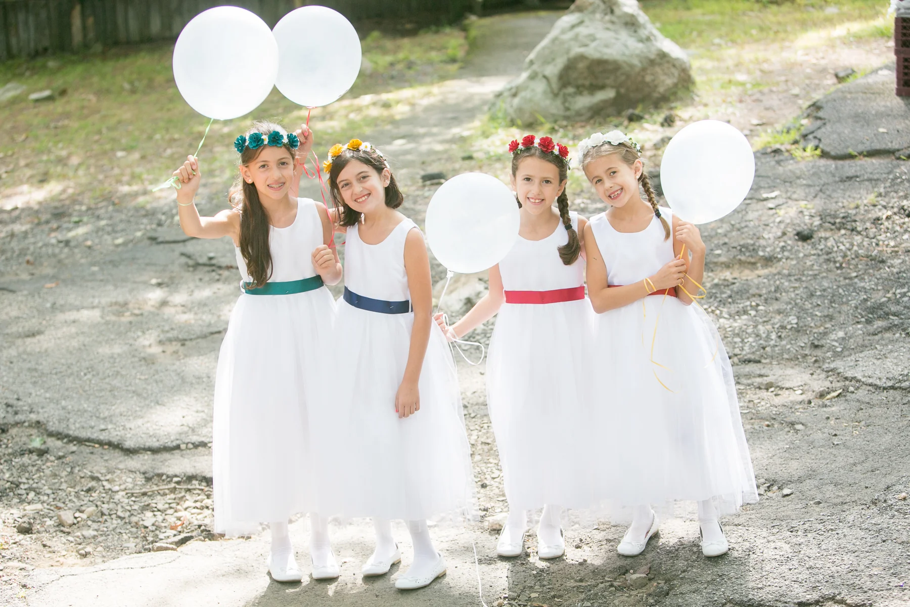 Girls in white dresses before the wedding ceremony