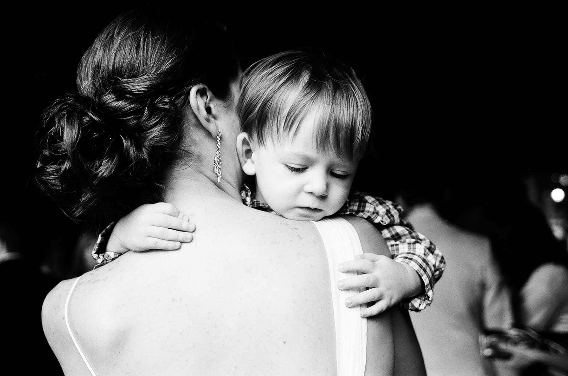 Little boy and his mother the bride during a wedding ceremony