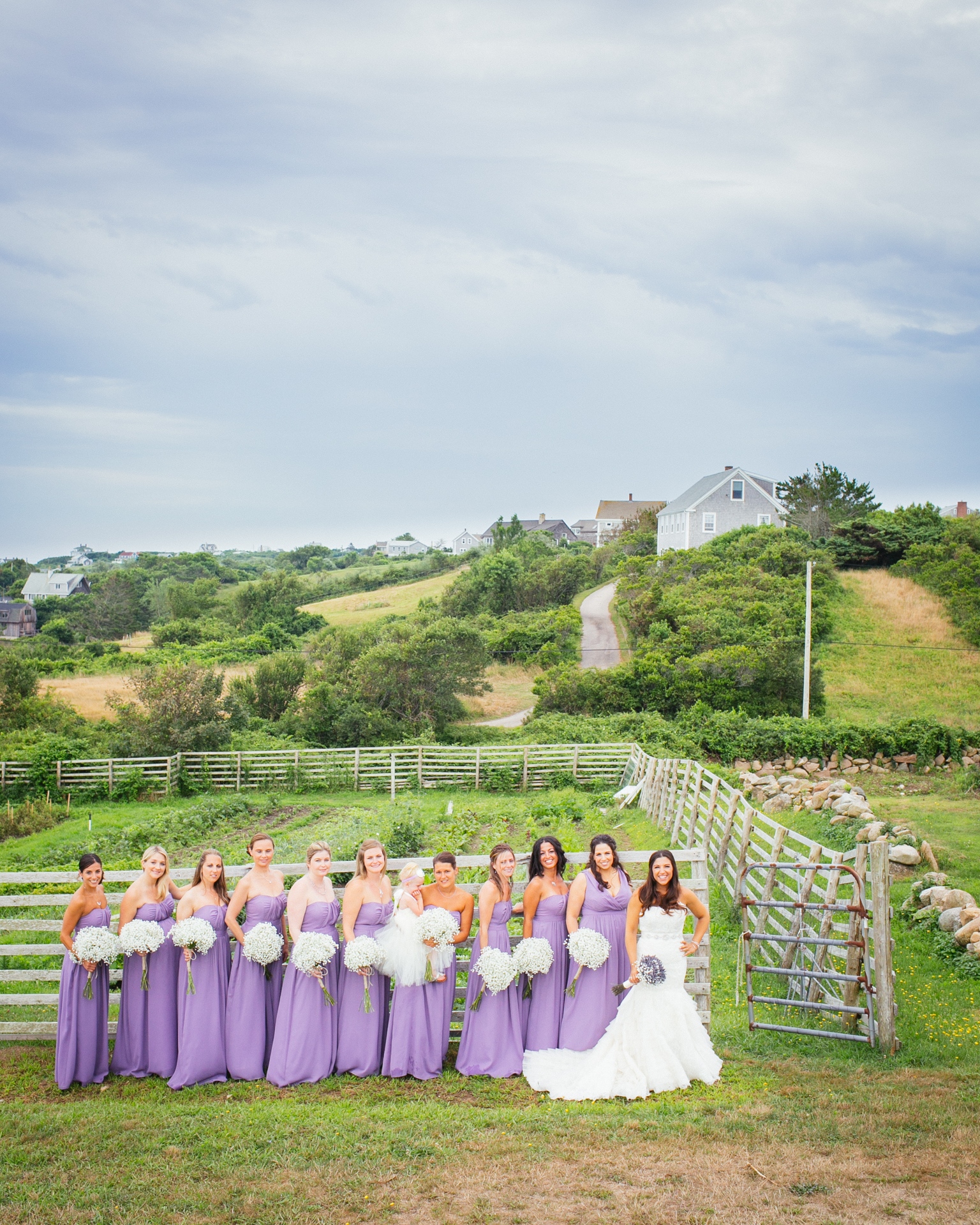  The bride and her bridesmaids outdoors before the ceremony 