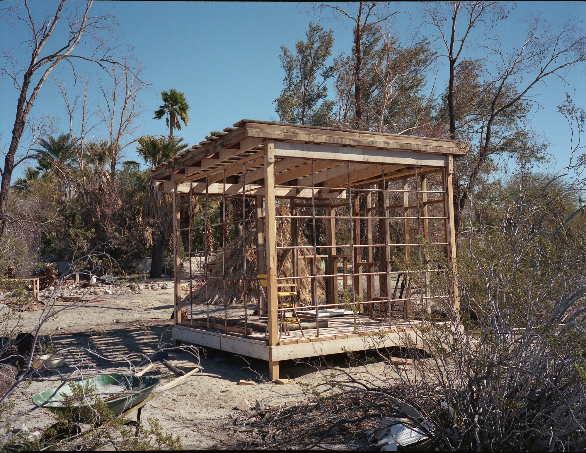 I went out to visit Harlan at his shack about 8 weeks ago and this is the stage it was at. He had just put up the framing, all with lumber he found around the desert.  