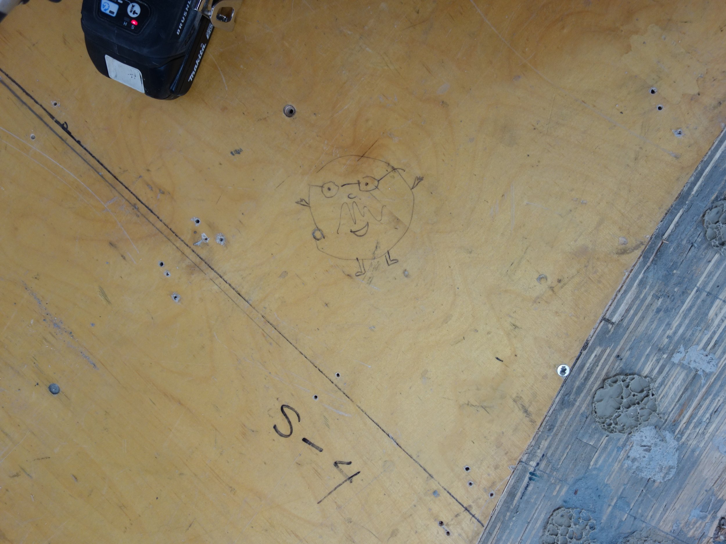  A little doodle on the subfloor to be revealed when the pool gets disassembled…someday! 