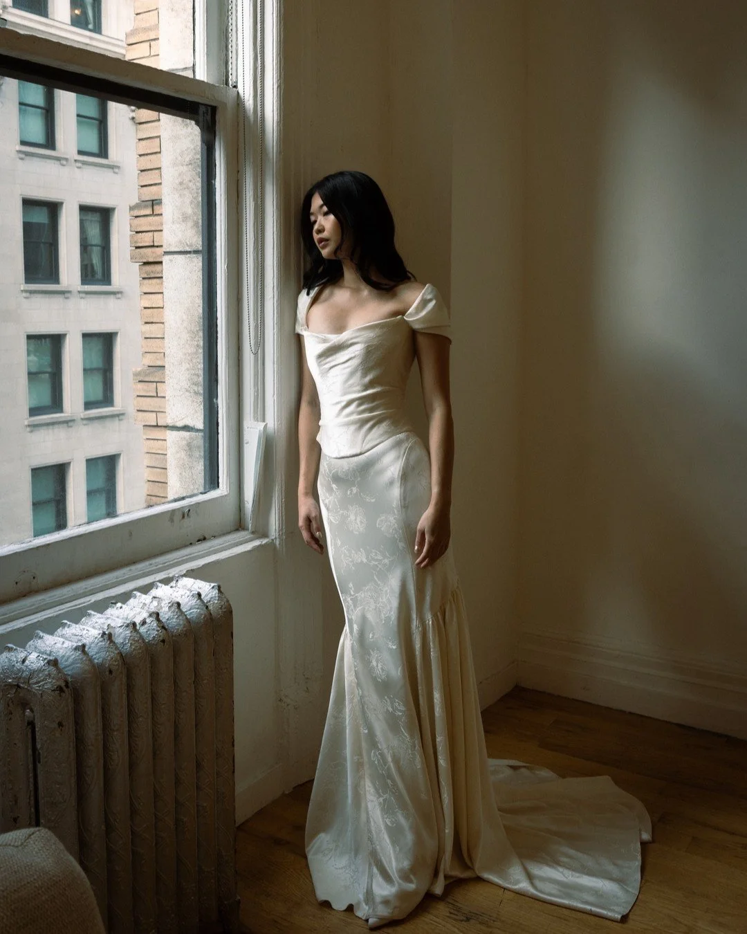 Etta Corset + Sleeve &amp; Adeline Skirt, looking dreamy in our New York showroom last month.

Crafted in a rich, buttery-toned ivory, the viscose satin is woven with a subtle floral jacquard that catches the light beautifully.

Versatile by design &