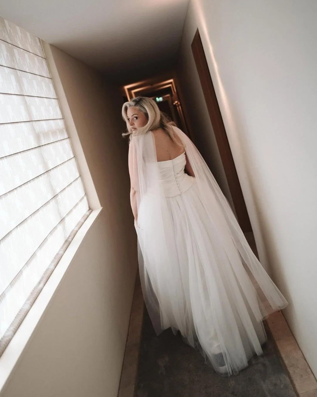 A moment for the bride. 

Faye wears the Mabel Corset, Marianna Skirt + Tulle Neck Scarf. A look that balances structure and movement &mdash; effortless and striking.

Captured by @mattgodkinweddings 🏹