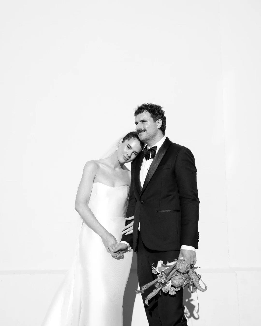 Just married. 
Pure perfection @em.r.m in the Mariska Gown + Elloise Tails. Captured beautifully by @kateandersonphoto_ | Prea James retailer @bluebellbridal