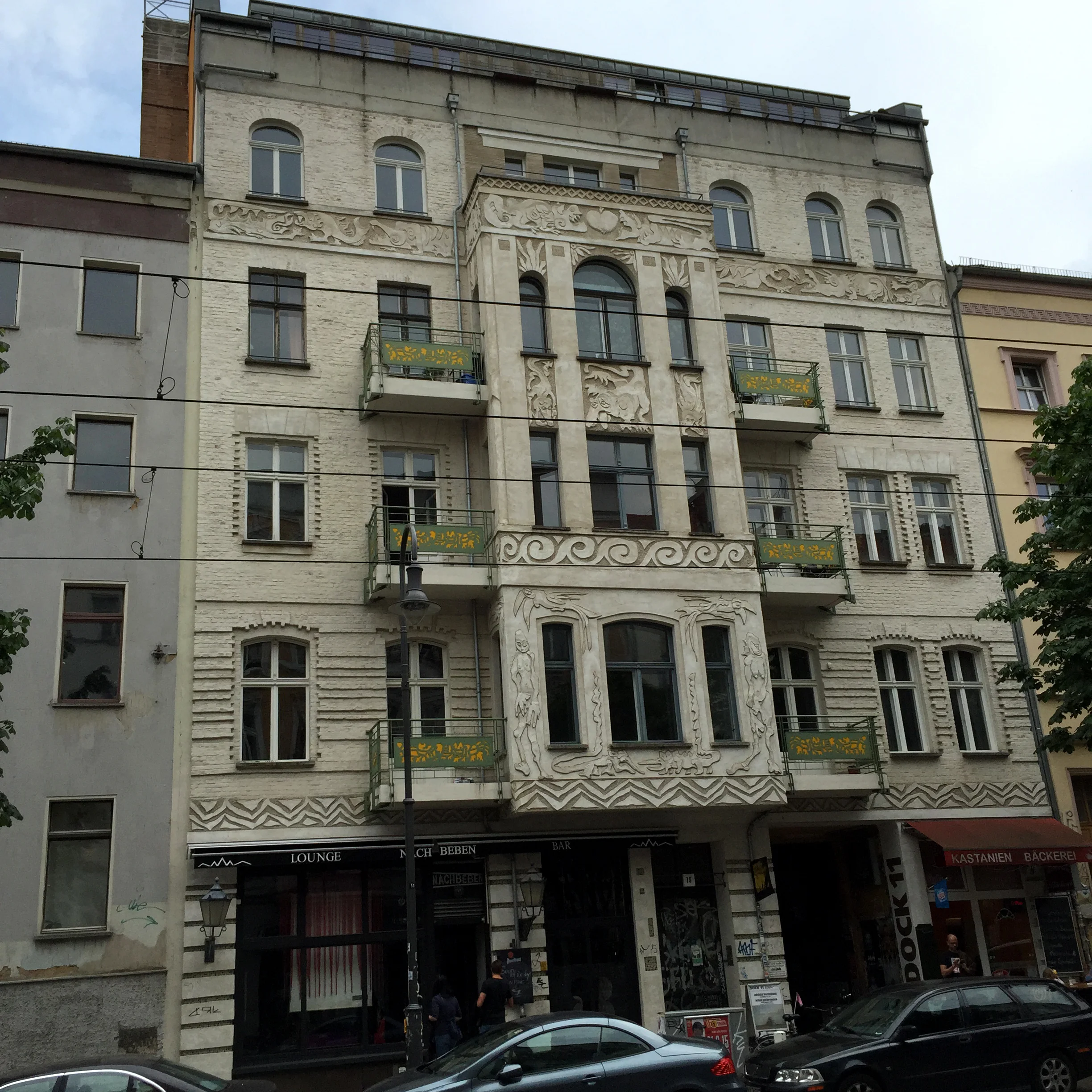 19th century apartment building flanked by more recent infill on Kastanienallee, Prenzlauer Berg. Throughout East Berlin these elevations speak of Vienna and Lodz and Budapest all rolled into one.