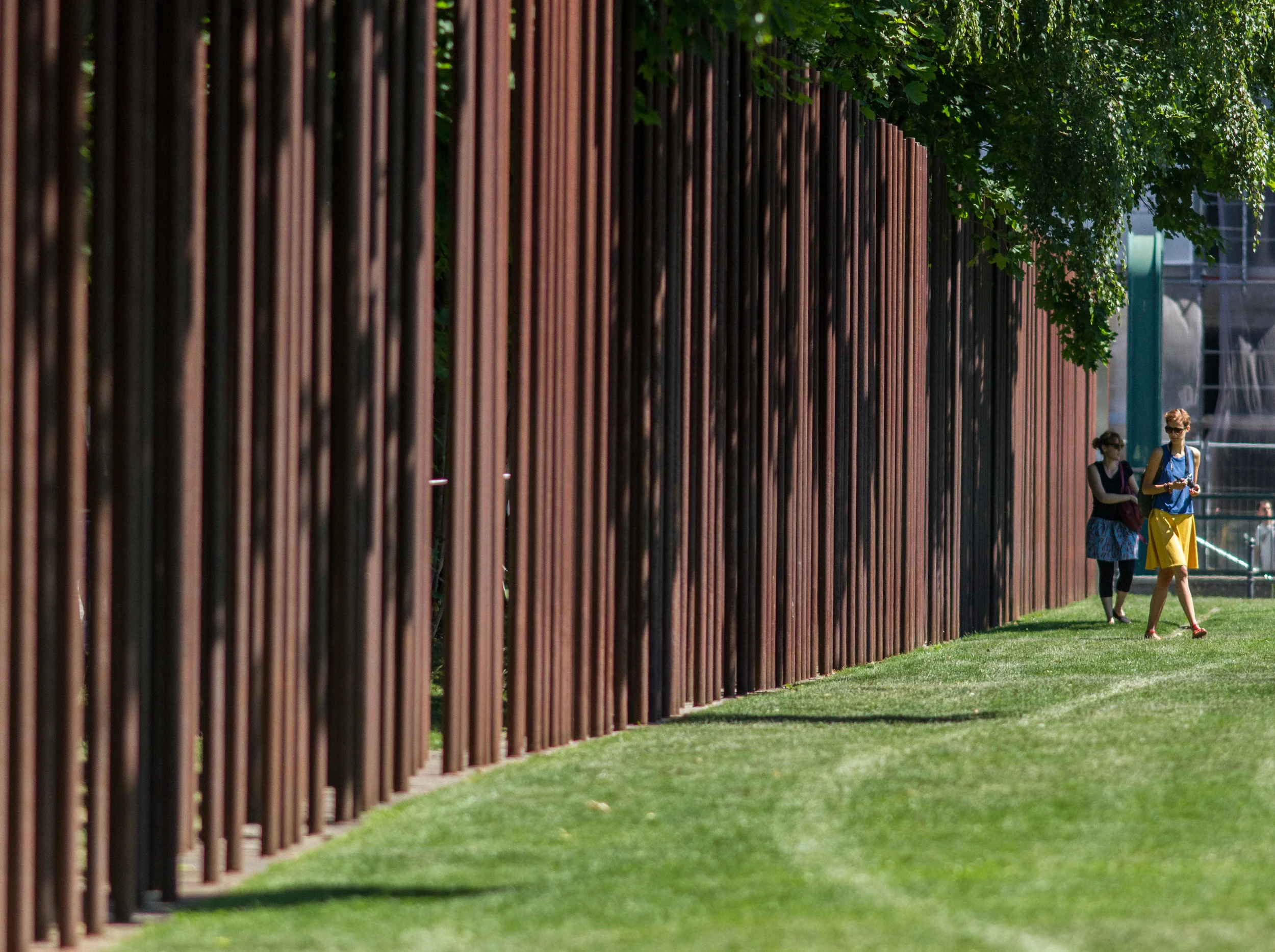 Dual rows of corten steel poles mark the route of the Berlin Wall along Bernauer Strasse. Image by John Dawson