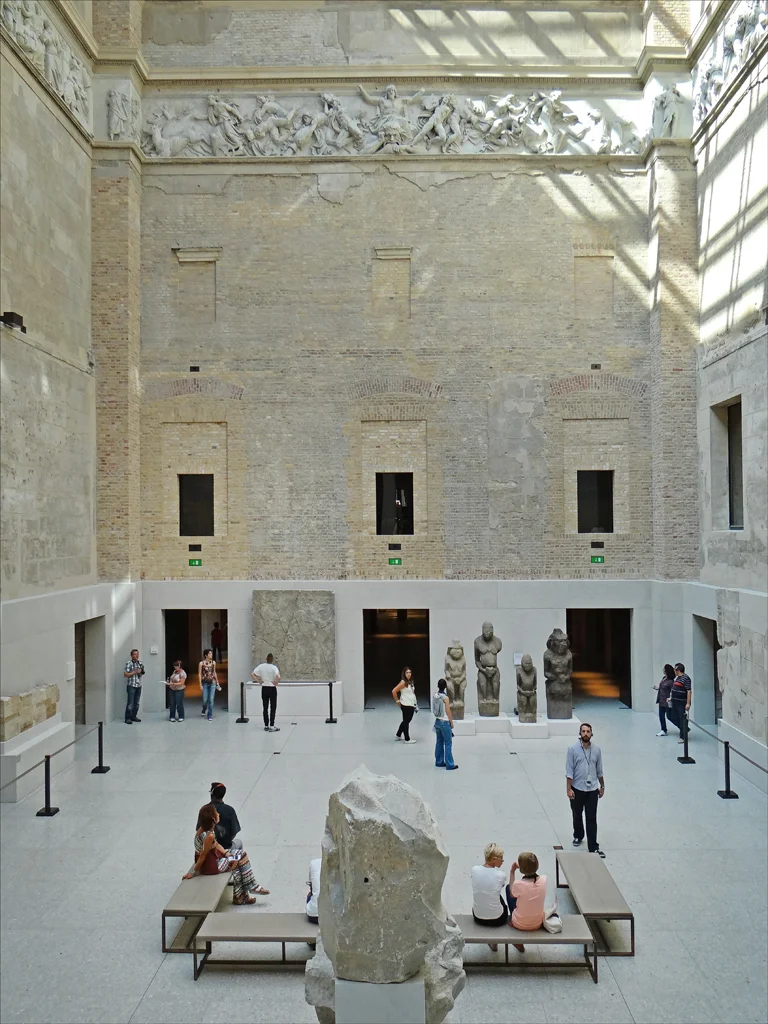 The Greek Court at the Neues Museum. The story of the building is quite literally told through its fabric. Image by Jean-Pierre Dalbera