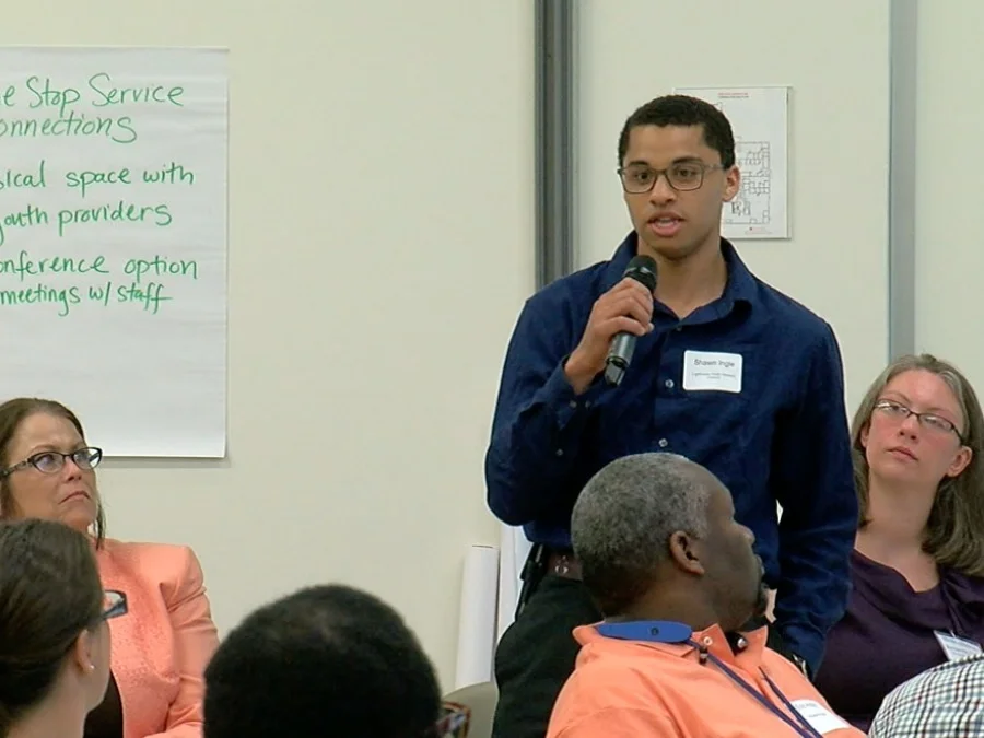 Shawn Ingle knows what it’s like to be homeless as a teenager. That’s why he has been working with two local nonprofit organizations to try to eliminate youth homelessness in Cincinnati and Hamilton County. http://www.wcpo.com/news/insider/how-local-groups-plan-to-end-youth-homelessness-by-2020-with-help-from-youth-who-have-lived-it “I really don’t want any other homeless youth to be in my shoes,” Ingle said. “To be sleeping under a bridge or begging for food.” For the past six months, Ingle and scores of other young adults, social workers and advocates have been coming up with new ideas to end youth homelessness here. Strategies to End Homelessness and Lighthouse Youth and Family Services are leading the work. The U.S. Department of Housing and Urban Development selected Cincinnati and Hamilton County as one of 10 communities for its Youth Homelessness Demonstration Program. The goal is for the communities to come up with new and innovative ways to use federal money to eliminate youth homelessness. Shawn Ingle speaks during a community meeting in May. Photo by Terry Helmer | WCPO Strategies to End Homelessness got a $3.8 million grant for the research and planning and has partnered with Lighthouse to create a draft plan that they must submit to HUD by July 13. “We’re going to see that there’s not one silver bullet to ending youth homelessness in any community,” said Meredith Hicks, planning and policy director for Lighthouse Youth and Family Services. “I think every community is going to have a slightly different plan.” The work is critically important because of the high numbers of homeless youth in our region.