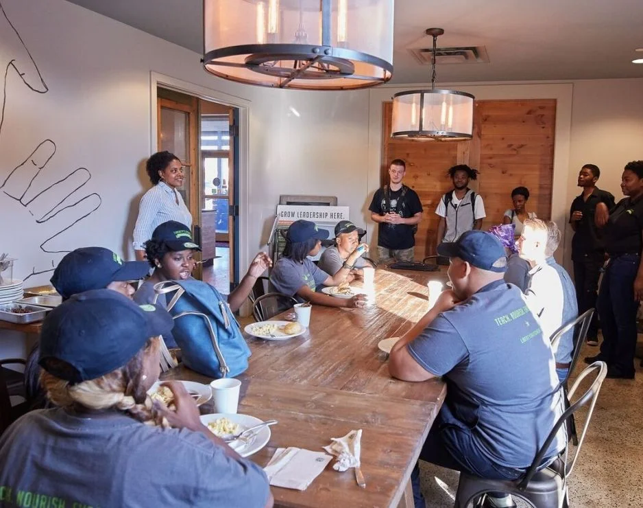 When Troy James arrived in New Orleans in January 2006, he felt the despair, loss and dread that Hurricane Katrina had left behind the previous summer. https://news.starbucks.com/news/starbucks-foundation-opportunity-for-all-grant The city was still physically destroyed, but its spirit was very much alive. “People were still going to work, helping their neighbors and trying to approach each day with hope,” James said. The optimistic sense of service that inspired a troubled city also launched a nonprofit called Liberty’s Kitchen – an organization designed to give unemployed youth leadership and life skills, and practical food-service job training. On Wednesday, The Starbucks Foundation announced that Liberty’s Kitchen is one of 41 nonprofits in 27 states to receive a 2017 Opportunity for All grant . This, its fourth grant from The Starbucks Foundation, is $50,000 to fund staff development and training, uniforms for students, activities for alumni and special events to promote the organization. When James, 49, moved to New Orleans as a Starbucks food service account services manager, he came across the new nonprofit and immediately saw the connections for Starbucks – and for his own passion. “I knew right away that I wanted to help them,” said James, who is now a district manager for licensed Starbucks stores. “I also knew that Starbucks would want to get involved because the organization’s objective was to help young people thrive, something Starbucks is also committed to.” The Starbucks Foundation was started in 1997 and since its inception has supported youth-related initiatives, initially funding youth literacy programs in the United States and Canada. In 2015, Starbucks initiated Opportunity for Youth Grants and that same year, to support nonprofits connecting young people to job skills training in North America. https://news.starbucks.com/news/starbucks-foundation-opportunity-for-all-grant This year, Starbucks has expanded the focus of the grants program to include youth as well as veterans and military spouses, and refugees, with a focus on supporting organizations that are working to help connect those facing barriers to jobs and education to a pathway to long-term economic opportunity. The foundation is making $1.41 million in Opportunity for All grants this year ranging from $10,000 to $100,000. Starbucks and Liberty’s Kitchen have established a close bond since it was established in 2009, beyond the financial assistance. Several months before Liberty’s Kitchen opened, Troy James made a formal commitment to donate Starbucks coffee for trainees to learn how to brew, and also to volunteer his time when they were up and running. Liberty’s Kitchen’s goal was to help transform the lives of vulnerable New Orleans youth by teaching them life and culinary skills that would hopefully lead to employment. So James offered to share the customer service skills he had gained as a Starbucks store manager with Liberty’s Kitchen’s teaching staff. He also agreed to speak with students about his work experiences. To enhance the organization’s youth development program, James with the support of the local company-operated team, helped develop a Starbucks course for the curriculum. Now, 92 percent of the program’s graduates find work. Jason “Frankie” Johnson is one of them. He was only 10 when Katrina struck and left several feet of water inside the family home in the Ninth Ward. The family bounced around among relatives. Johnson graduated from high school, but after a year of college he dropped out, and lived for a time in a homeless shelter. Now, he is an employed graduate of Liberty’s Kitchen. “I was excited because I was interested in learning more about cooking – I see it as another art form,” he said. Johnson thrived in the Liberty’s Kitchen youth development and leadership program. After the mock interview portion of the program in 2015, he was encouraged to apply for a barista position at Starbucks. He applied on a Friday and by the following Monday, he had the job. “I was intrigued by what Liberty’s Kitchen offered to young people, which was a second chance and opportunity to empower themselves,” said Bagneris. “It offered real achievable results by teaching culinary skills in a measurable amount of time. That is what kids want. It was also embedded in the framework of the hospitality industry, the bedrock of work in New Orleans. That made sense to me.” “We’re doing everything we can to engage more young people,” he said. “We have a staff of between 65 and 70 people and many of us are on the ground speaking at churches, schools and engagements across the city. Even if we only get a young person in the door and through a few weeks of study, we’ve given them some level of skills development and that’s a plus for us.” Those who finish the nearly one-year program receive a certificate of completion for learning a variety of cooking methods, knife and other culinary skills and the importance of personal responsibility. Students also graduate with a 12-piece knife set and access to Liberty’s Kitchen resources and support whenever necessary. In 2014, Liberty’s Kitchen expanded to a new 10,000-square-foot facility at 300 North Broad Street and opened a corporate cafeteria downtown this year. With all that the nonprofit has accomplished, Bagneris says there is more work for the organization to do. “We want to change the face of what it means to be workforce development. We want to work against disparities, challenge ideas of racial inequities, and promote new types of learning to provide the best outcome for young people,” he said. “This work has changed me,” said Starbucks’ James, who has been with the organization from the beginning. “We often don’t see the least among us who need the most among us. I now go out of my way to see people I didn’t see before.” For Johnson, now two years into his job as a barista at Starbucks, life is back on track – and just getting started. He has returned to school – this time at Tulane University. “Both Starbucks and Liberty’s Kitchen helped me to progress and open my heart up more,” said Johnson. “I now have a sense of home, more openness and loyalty from people who care about me and express that care whenever they can.” “I feel great about what I’ve been able to accomplish, but I’m not yet satisfied. There’s more to do,” he said. “I understand that time takes its time, so I’m going to be patient.”
