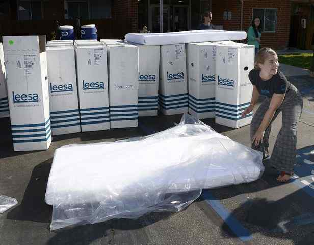 More than 100 youth and families received free mattresses Wednesday as part of a giveaway promoting better sleep and wellness. http://www.pasadenastarnews.com/social-affairs/20170830/more-than-100-mattresses-given-to-foster-youth-families Leesa, an online direct-to-consumer luxury mattress company, donated 111 new mattresses to Hillsides’ Youth Moving On program families. The nonprofit serves youth transitioning from foster care to adulthood. The giveaway also benefited families served by Hillsides’ Family Resource Centers, and Hillsides’ Foster Care and Adoptions program run by its affiliate Bienvenidos. “ This is the basics that all of us have, and these clients don’t have it ,” said Hillsides Chief Advancement Officer Carrie Espinoza. “It will be really affirming to them, and show them that people care and are trying to help them improve their life.” Leesa donates one mattress for every 10 they sell, and has provided more than 18,000 mattresses to date to nonprofits that serve people seeking refuge from homelessness, domestic risk and human trafficking. “Sleep is a powerful thing,” said Jen-Ai Notman, social impact representative with Leesa. “We want people to wake feeling refreshed and ready to make the most of their education, or life.” Dr. Drew Pinsky, better known as Dr. Drew, is a longtime supporter of Hillsides along with his wife, Susan, a former Hillsides gala chair. Both were on hand at the giveaway. “Hillsides is doing it right, from top to bottom,” Pinsky said of Hillsides’ work. “These kids, these families, they’re tramautized and it takes a while to build trust and reengage with the world .” Pinsky broadcast his daily KABC radio show, “Dr. Drew Midday Live with Mike Catherwood,” live on Wednesday before the giveaway at the Youth Moving On Peer Resource Center, just down the block."