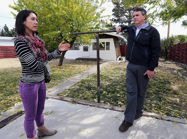 By the end of this year, 16 homeless young people in Mesa County will have a new place to call home. http://www.gjsentinel.com/news/articles/three-homes-8232planned-for-8232atrisk-youth8232 Karis, the Grand Junction-based nonprofit group dedicated to helping and empowering homeless and at-risk young people, is in the process of purchasing three houses to serve as long-term homes for unaccompanied homeless youth. Bolstered by a five-year, $1 million grant from the U.S. Department of Health and Human Services and a grant from the Colorado Department of Local Affairs, Executive Director John Mok-Lamme said the group is currently renting the three homes and ultimately plans to buy them. Karis had to come up with another $150,000 to partially match the Health and Human Services grant. Karis already operates several shelters for homeless and at-risk young people in the Grand Valley, including The House, an emergency shelter for homeless young people. People can live at The House for three weeks at a time and are given intensive case management and services while there. But for some, Mok-Lamme said, three weeks is nowhere near enough time. “You can tell, at The House, that they’re very grateful to be there, but they’re anxious right away about how long they have. They can’t exhale,” Mok-Lamme said. “When we wrote the grant, we called this a place to exhale. We just need a place where (youth) have a little more time.” Qualified teens and young people will be able to live in the houses, rent-free, for up to two years while still receiving services, counseling and guidance from the organization’s staff and volunteers. In total, there will be 13 rooms in three houses as well as three rooms in foster homes for younger teens, Mok-Lamme said. Sarah Fuller, program coordinator at The House, said giving long-term housing to teens and young people gives them the stability to finish school, find and keep a job, save money and begin to heal from the trauma that often accompanies homelessness. “Some of our teens cycle in and out of The House a lot. They might be able to move in with a family member or friend and stay stable for a few weeks or months, but maybe their family isn’t stable enough to keep them stable so then they end up back with us,” Fuller said. “When that happens a lot, it keeps the teen from being able to make a lot of progress on their goals because their lives are so tumultuous. Giving them a place to stay where they don’t have to worry about getting kicked out would allow them to relax and breathe a little bit.” Mok-Lamme said after The House opened in 2013, it became clear that homeless young people needed long-term housing solutions. “I think we’ve known since six months after we opened The House that it’s not going to be enough for homeless kids to have short-term housing,” he said. The DOLA grant will take the form of housing vouchers that pay a portion of the market value of rent — around $400 per month, per person. The state grant is good for three years, after which Karis would have to reapply for more money. While the cost of renting and ultimately purchasing the homes is largely accounted for through grants, those homes still need to be furnished, Mok-Lamme said. That’s where he hopes the community will step up with donations. “For all three buildings we are probably 10 percent funded for furnishings,” he said. “Furnishing is a big need for us right now.” Fuller said she is excited to think about the impact stable housing will have on the teenagers she works with. “I’m imagining what their lives will be like two years from now if they’re able to get a spot like this,” she said. “It’s neat to think about what a difference it could make for the teens I know, if they have a place to stay, if they have a case manager helping them figure out transportation to school or helping them write a resume.”