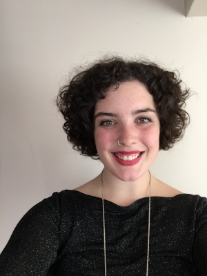 Mollie Cronin was born in Windsor, Ontario, in 1993 and grew up in Fredericton, New Brunswick, and Halifax, Nova Scotia. She completed the Foundation Year Programme at the University of King’s College in 2012 before transferring to NSCAD University where she earned a Bachelor of Arts Degree in Art History in 2015. A self-described “art brat”, Cronin was raised by two parents both heavily involved in the Halifax arts scene and has grown to become an involved member herself – whether this involvement takes the form of curation, writing, speaking, volunteering, or through the arts podcast that she runs out of the No Offense* Gallery on Gottingen street. Mollie Cronin currently resides in Halifax where she works full-time as a collections supervisor, as well as a freelance writer and curator.