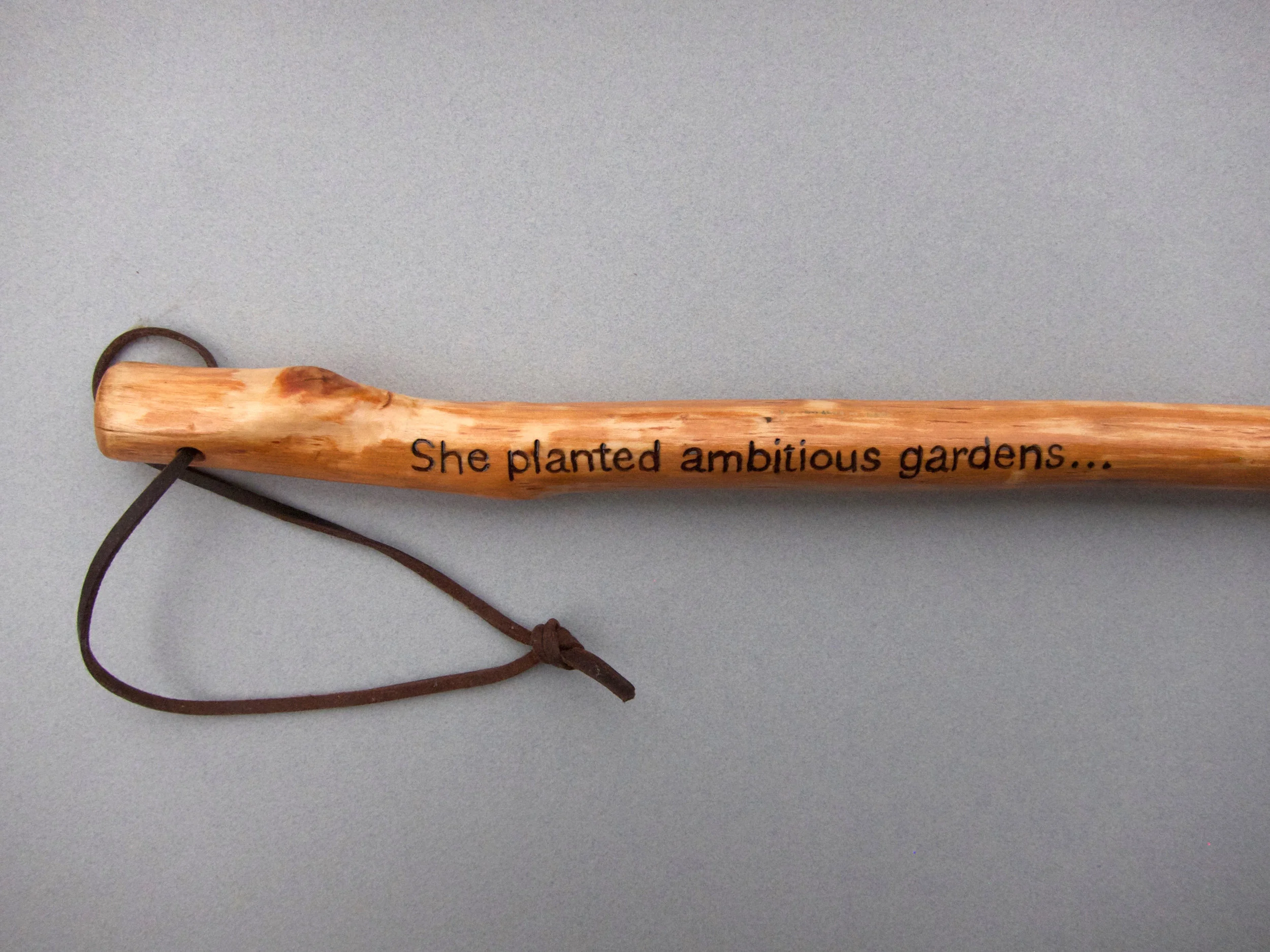 Untitled (Gardening is not a rational act. Margaret Atwood) 52”(l), alder, spar varnish, vibrim, leather, 2014, 100.00 CAD – SOLD (two others available upon interest)