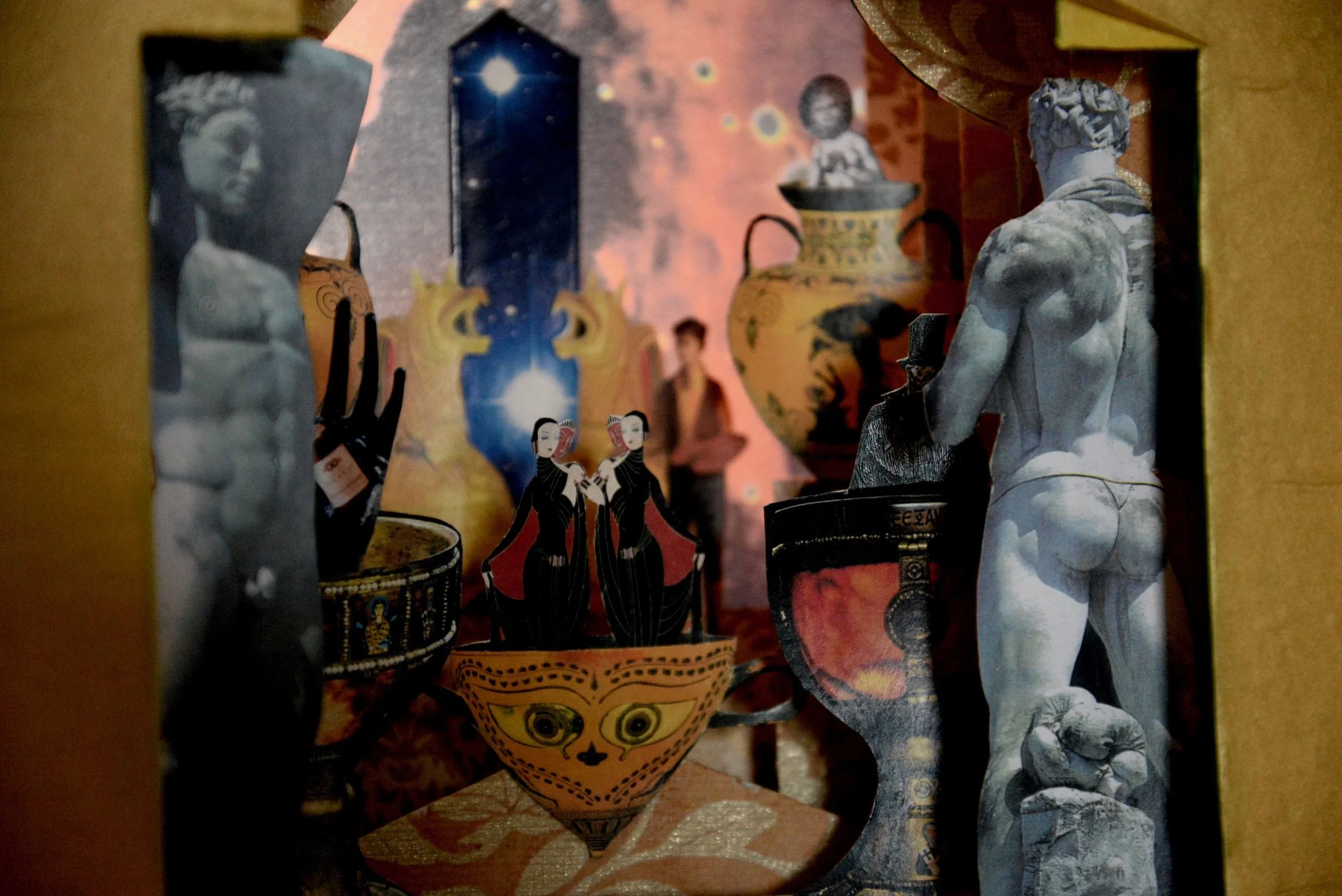 Lightbox detail view, Cosmic Future March, 2016, Paper and matt board collage, 9” X 10” X 5”, 400 CAD