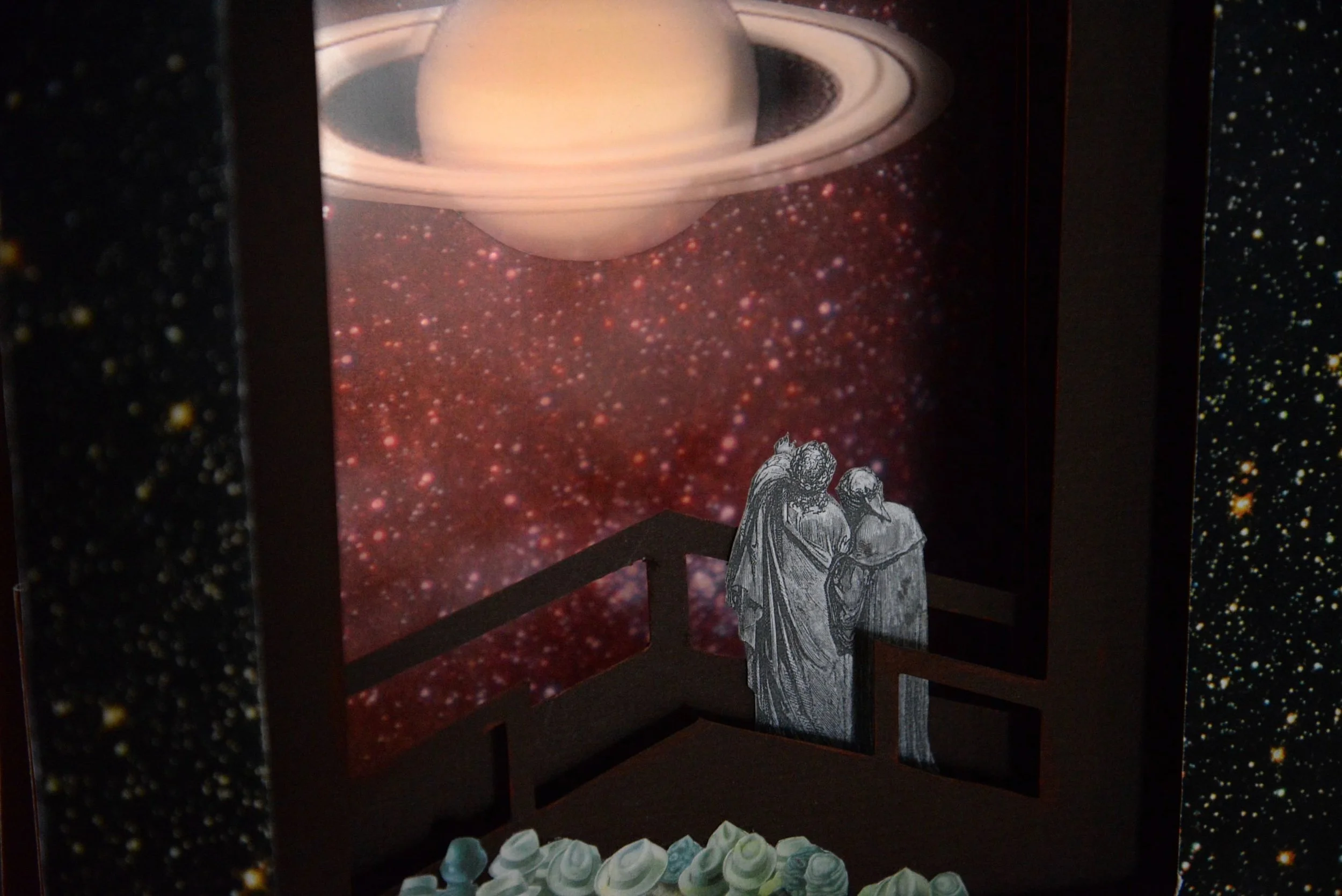 Lightbox view, Viewing Platform for the Planet Saturn, February 2013, Paper and matt board collage, 9” X 10” X 4”, 400 CAD