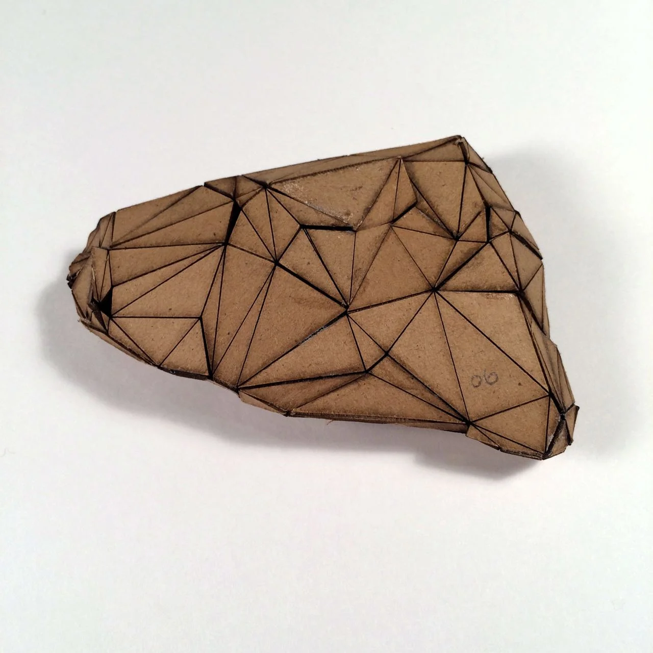 (Front view) 006 - Boxes For Rocks, laser cut cardboard, found rocks, glue, 12cm x 8.5cm x 3cm (flatish), 2012, 250 CAD