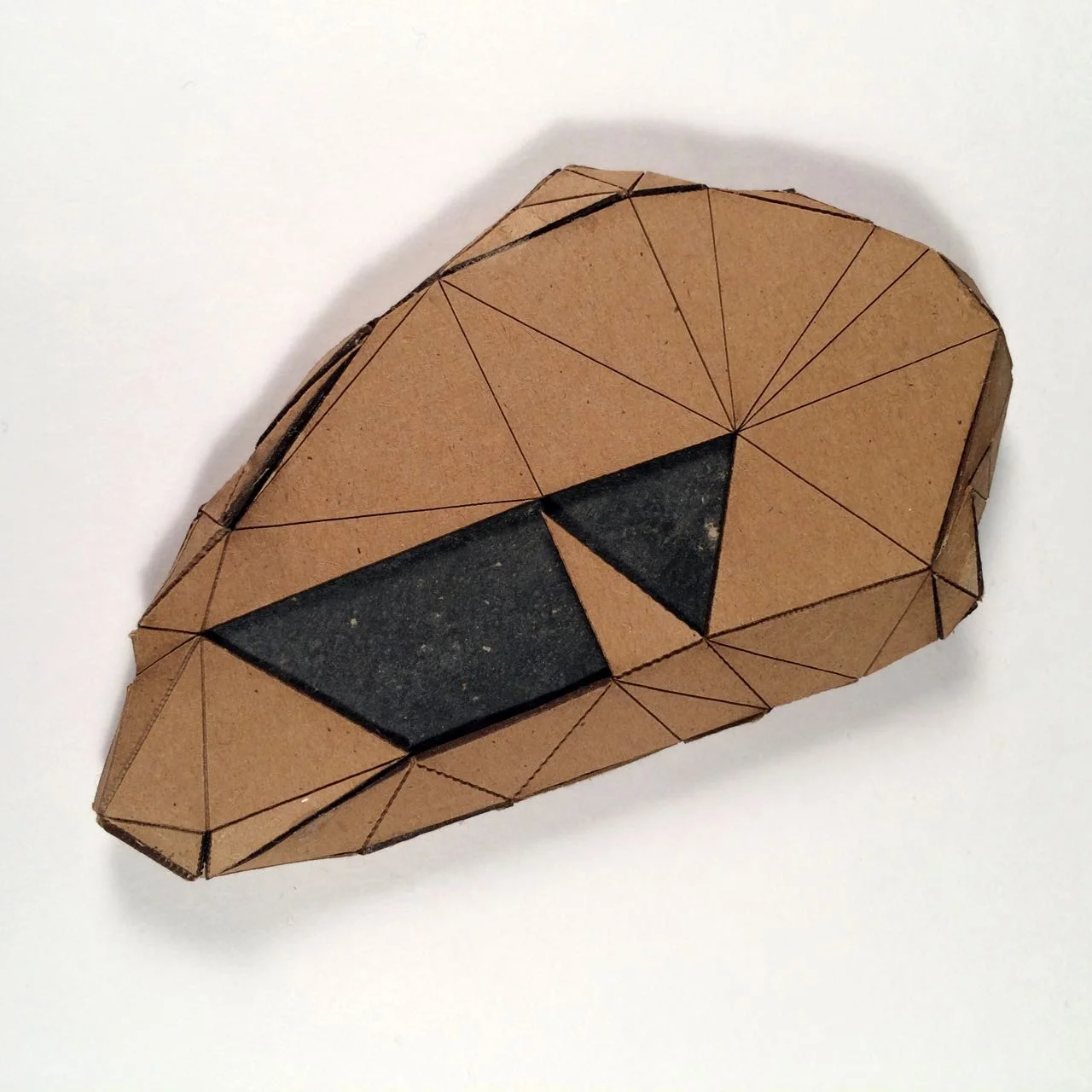 (Back view) 011 - Boxes For Rocks, 2012, laser cut cardboard, found rocks, glue, 13.5cm x 8.5cm x 1.5cm (flat), 250 CAD