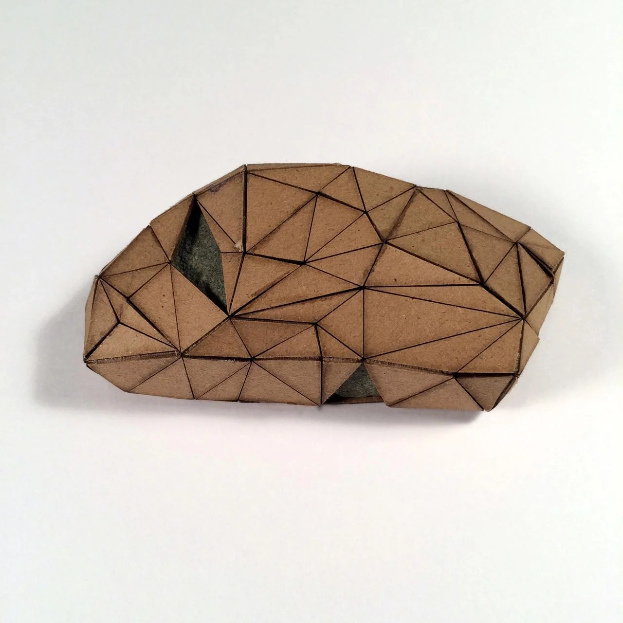 (Front view) 041 - Boxes For Rocks, 2012, laser cut cardboard, found rocks, glue, 5cm x 4.5cm x 3cm (squarish), 250 CAD