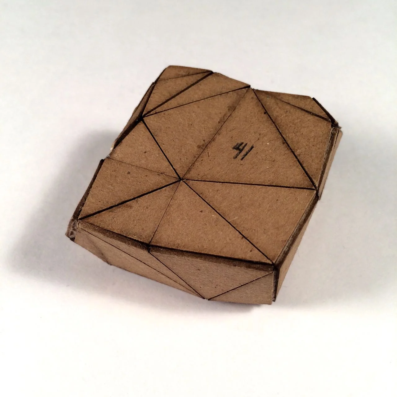 (Front view) 024 - Boxes For Rocks, 2012, laser cut cardboard, found rocks, glue, 9cm x 7cm x 3cm (flat bottom), 250 CAD
