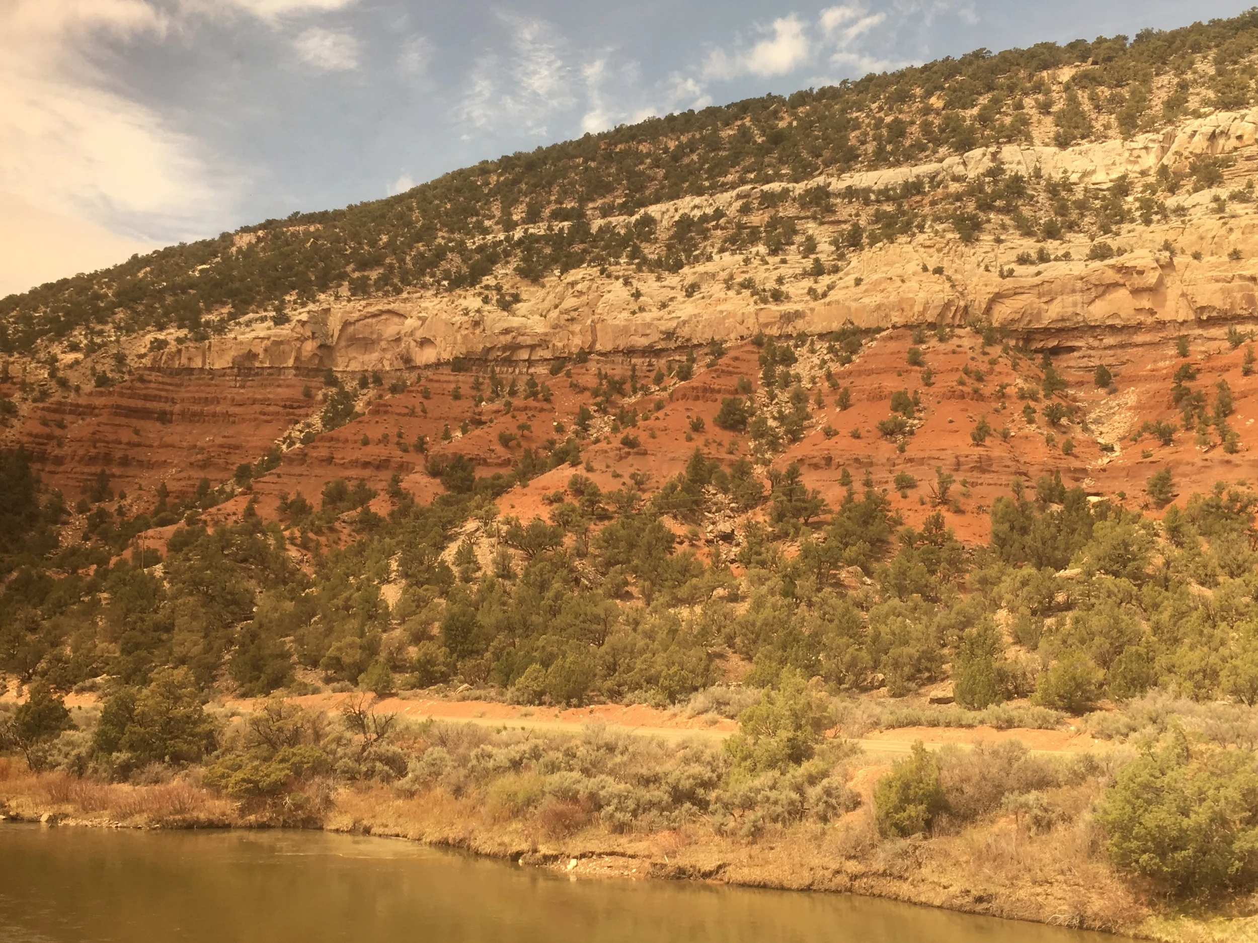 This photo (and the video below) simply don't do the red justice. Blurry/dirty train windows... 