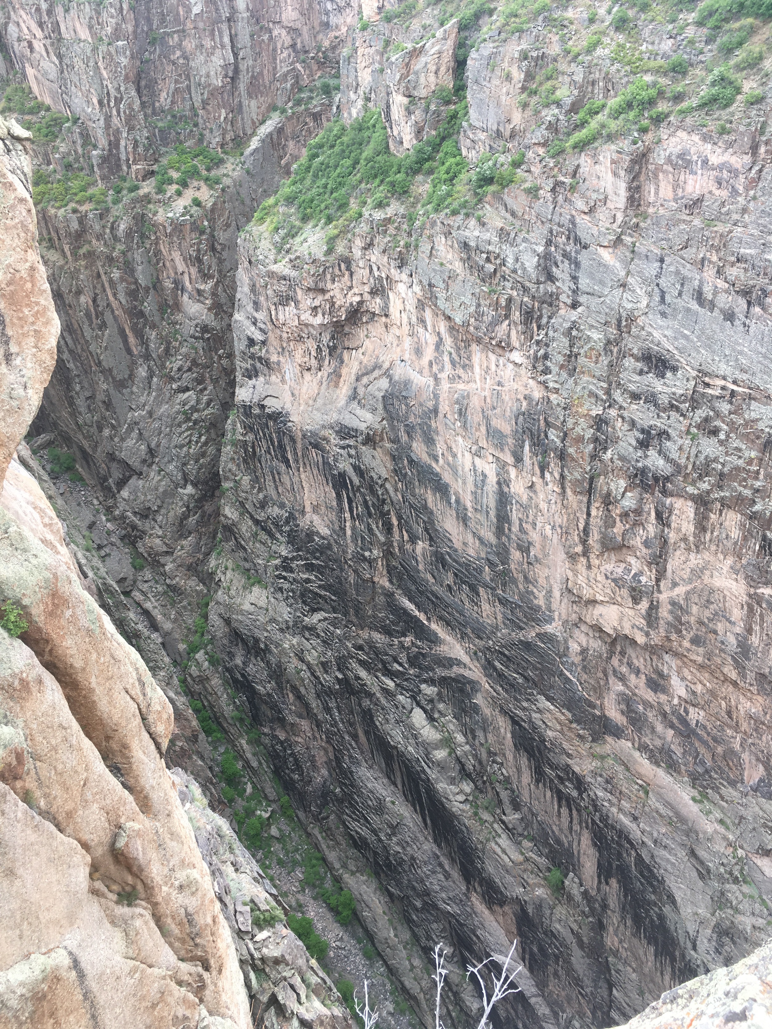 Discoloration and true black-canyon walls.