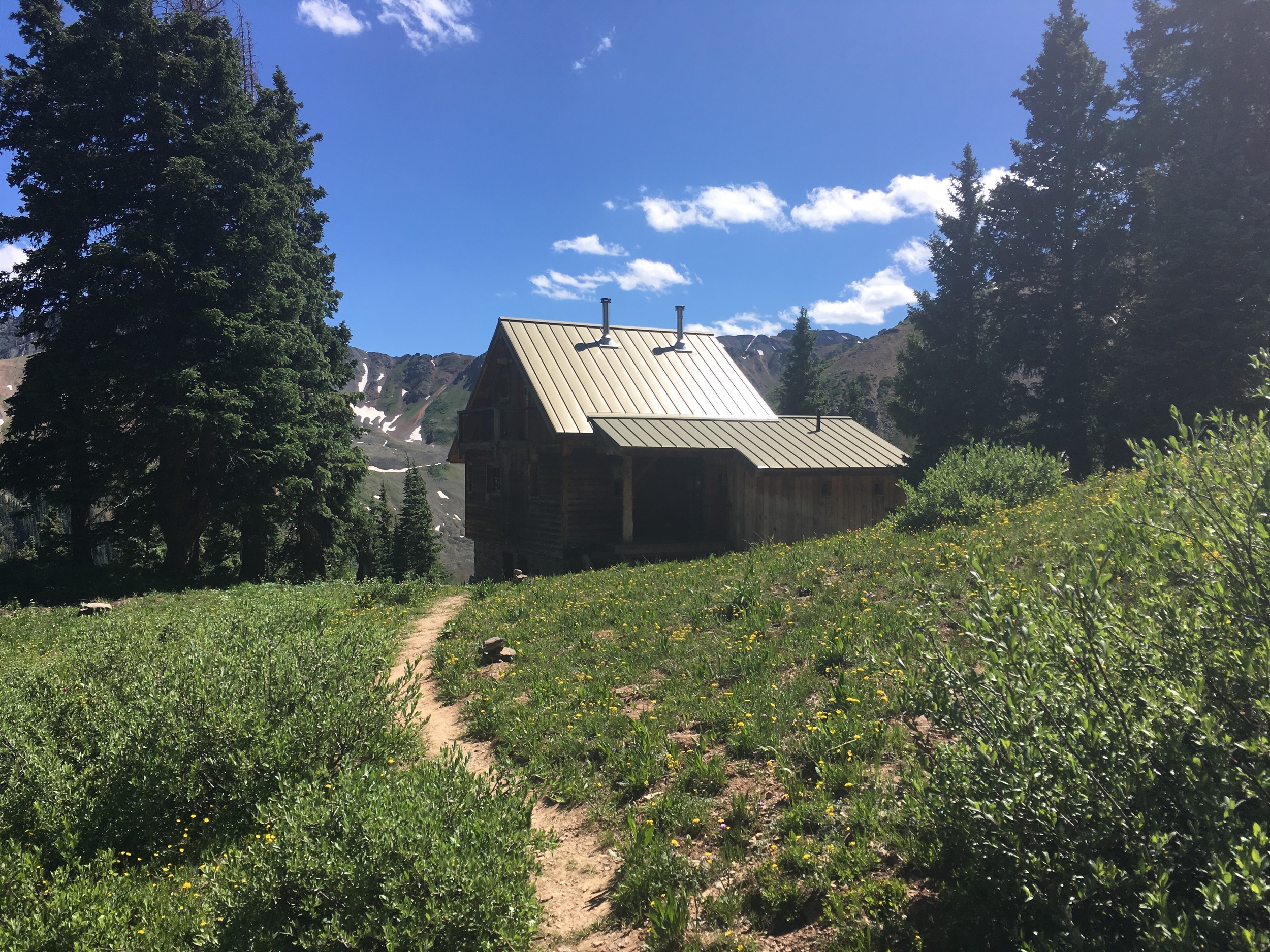 Approaching the hut after a long haul.