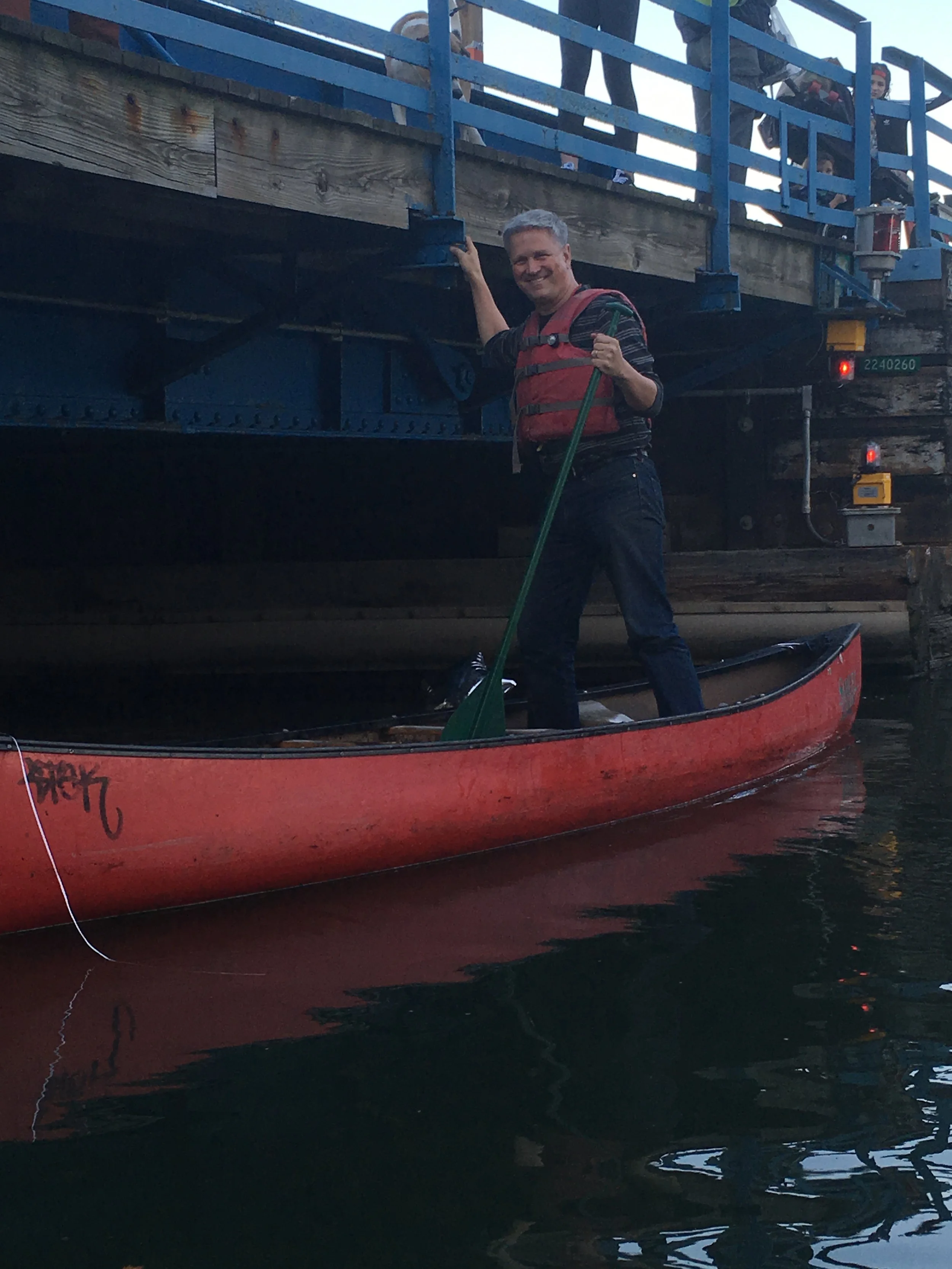 Owen captaining his canoe.