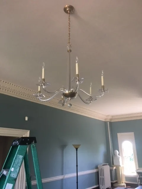 IT TOOK MANY MONTHS BEFORE WE WERE ABLE TO INSTALL NEW, MODERN CHANDELIERS INTO THE SPACE (WE SPENT A LONG TIME TRYING TO RESTORE THE HISTORIC ONES, TO NO AVAIL)